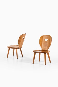 Fauteuils Carl Malmsten fabriqués par Svensk Fur en Suède