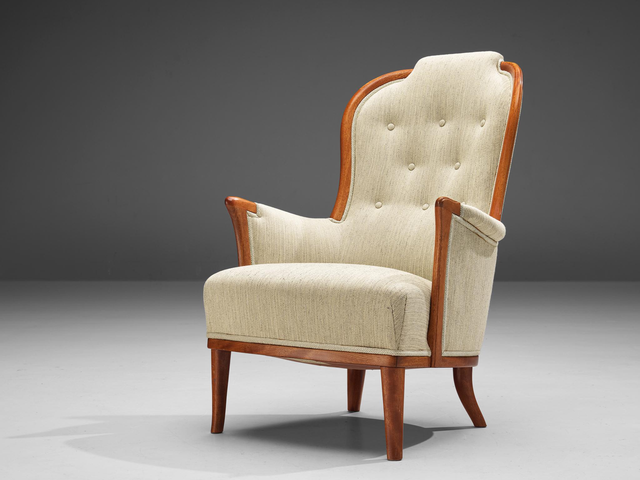 Carl Malmsten for O.H. Sjögren, 'Our Lady' easy chair, teak, fabric, Sweden, 1950s. 

Very interesting Swedish lounge chair by Carl Malmsten in off-white fabric with tufted back. The distinctive lines and graceful curves of its design create a