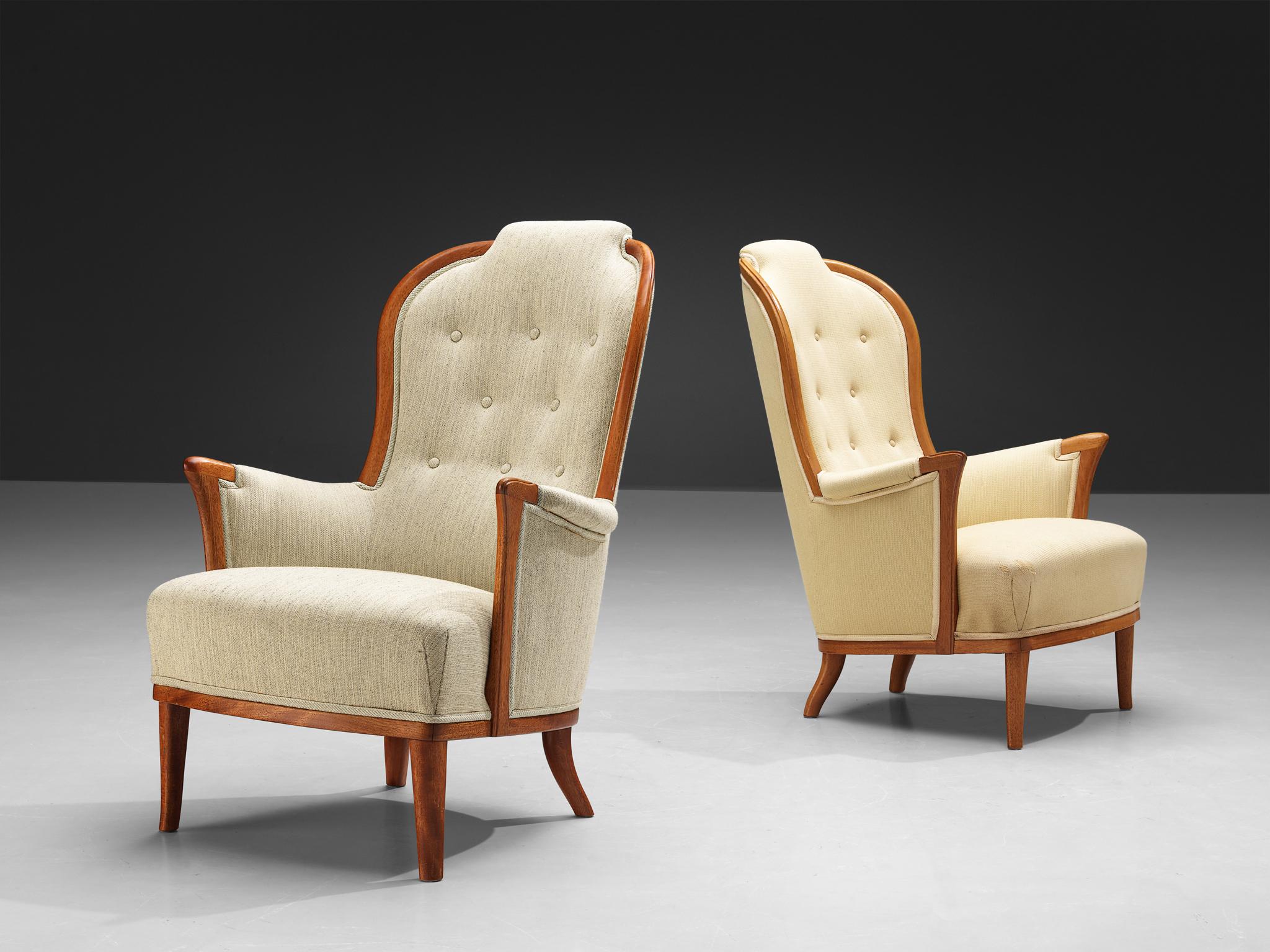Carl Malmsten for O.H. Sjögren, 'Our Lady' lounge chairs, teak, fabric, Sweden, 1950s. 

Very interesting pair of Swedish lounge chairs by Carl Malmsten in off-white and pastel yellow fabric with tufted back. The distinctive lines and graceful