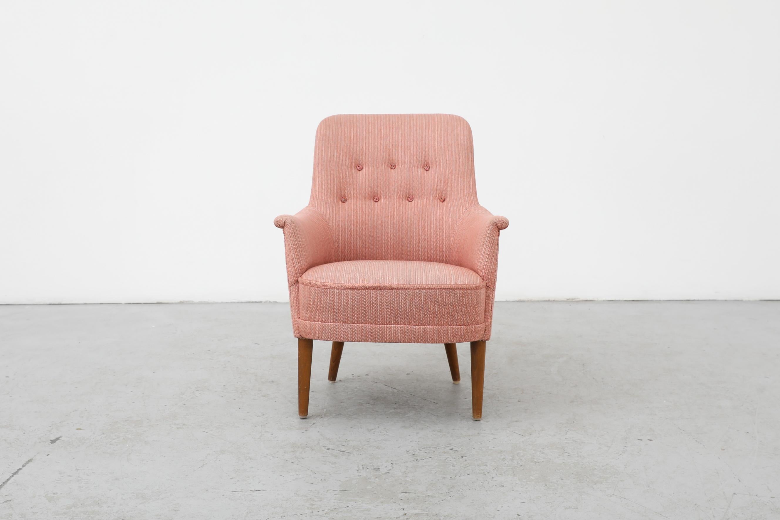 Vintage 'Husmor' pink lounge chair designed by Carl Malmsten for O.H. Sjögren. In good condition with wood in original condition showing visible signs of wear consistent with its age and use. The upholstery was done by previous owner and shows some