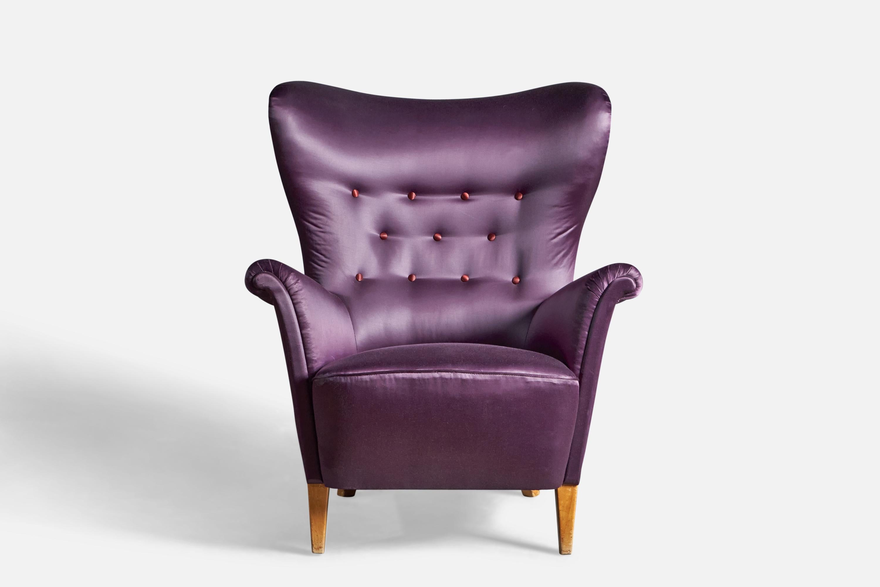 A purple velvet and light birch lounge chair, designed and produced by Carl Malmsten, Sweden, c. 1940s.
