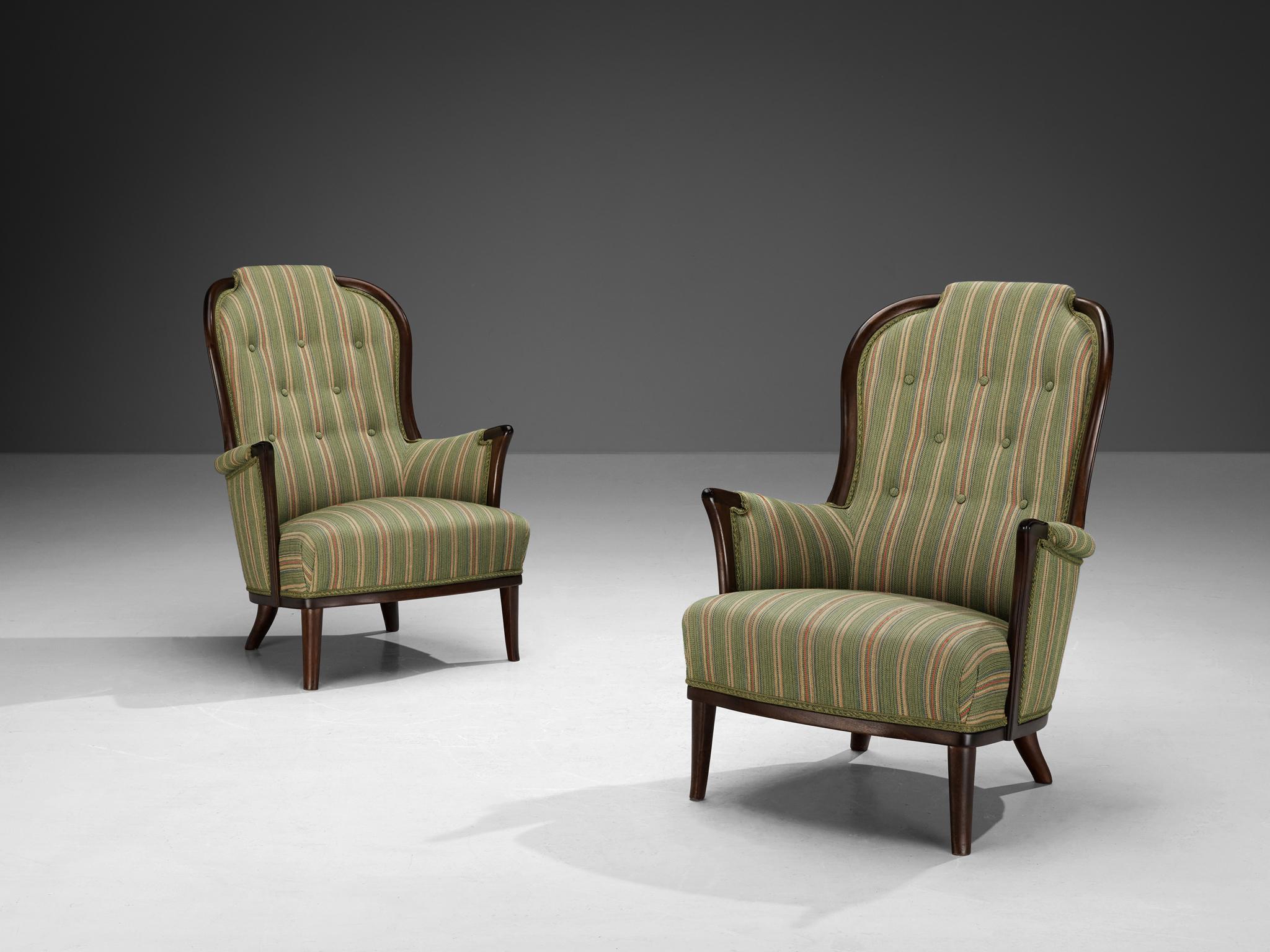 Carl Malmsten for AB O.H. Sjögren, pair of easy chairs, fabric, mahogany, Tranås, Sweden, 1987

Pair of wonderful chairs that are very well designed by Carl Malmsten. The armchairs are upholstered in the original fabric mainly in the color green