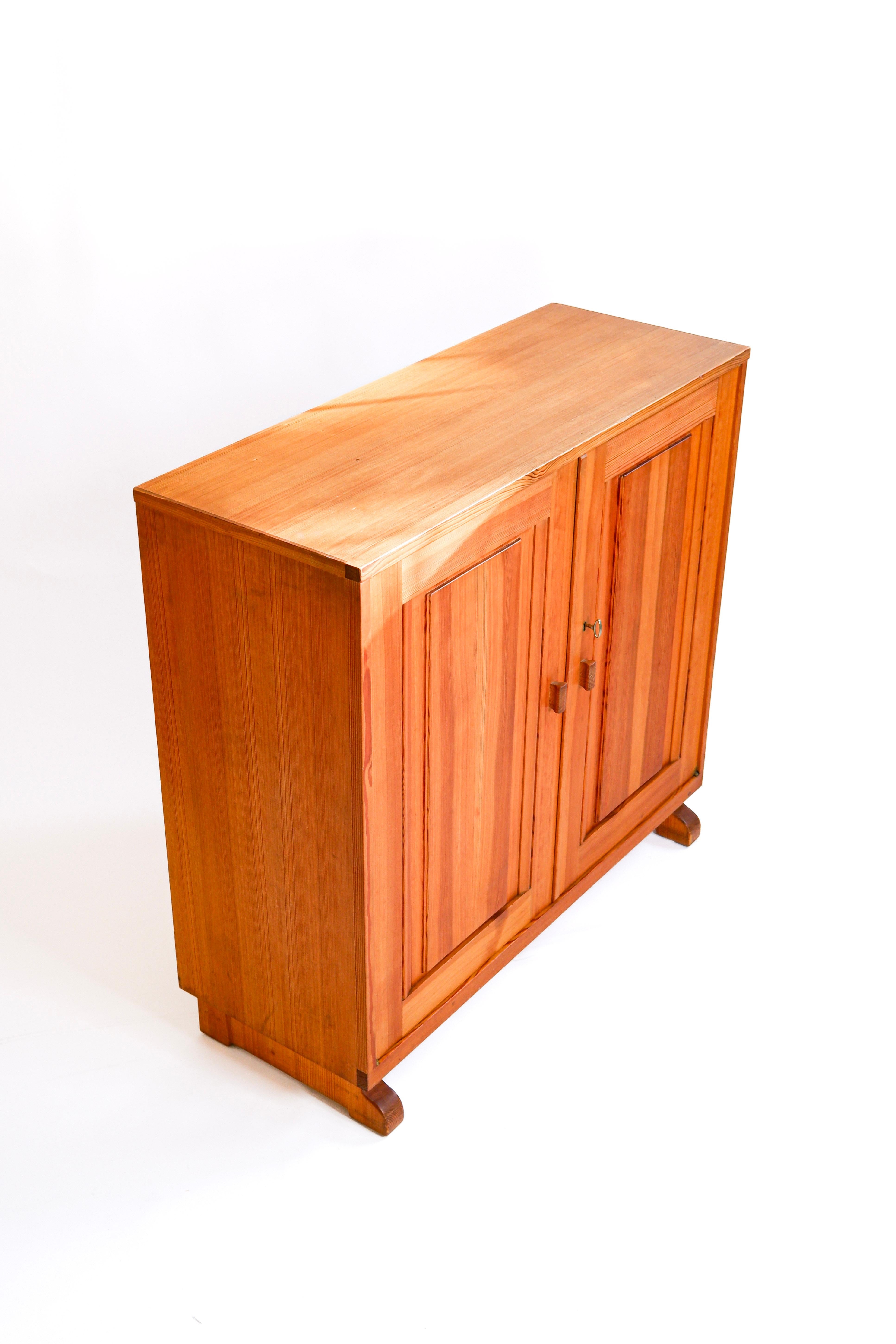 Scandinavian Modern Carl Malmsten pine cabinet, circa 1950. For Sale