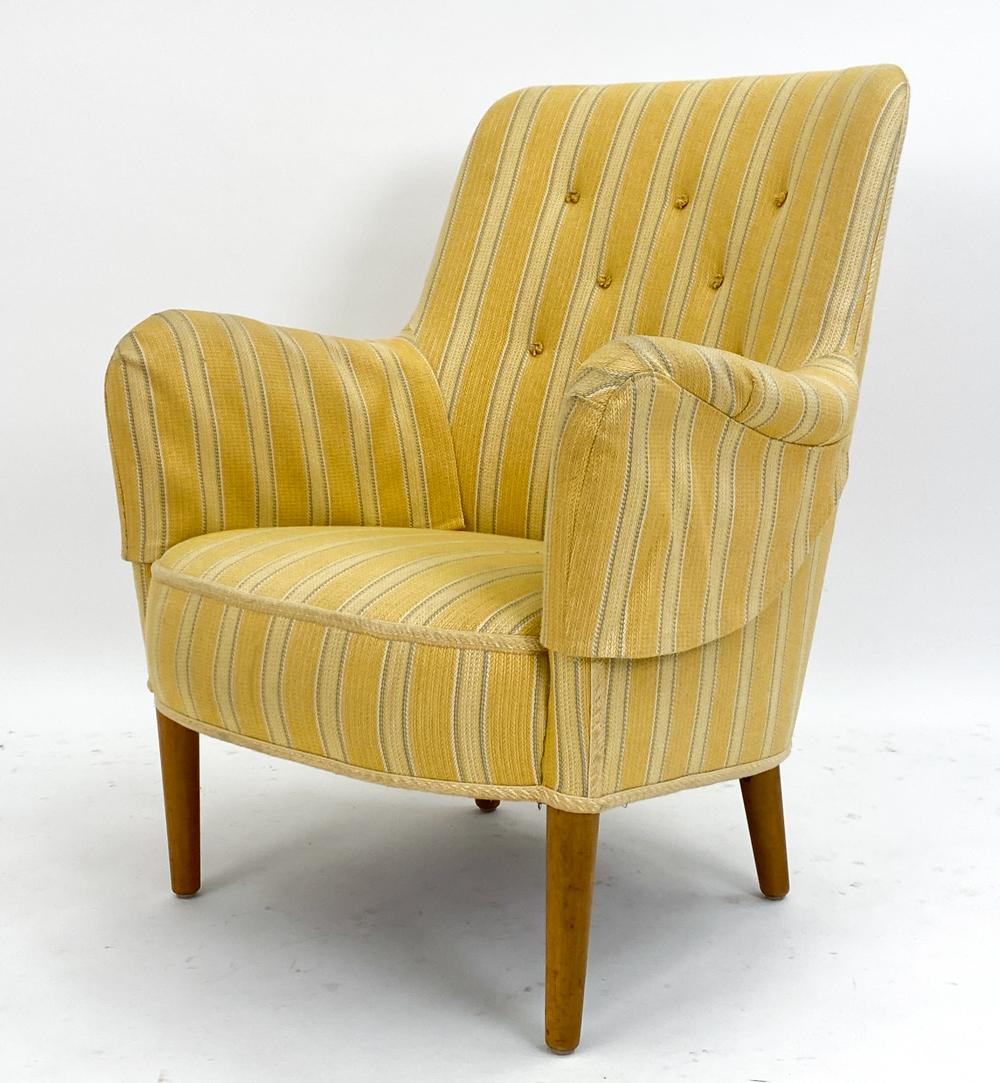 This is a distinguished 'Samsas' lounge chair, an iconic design by the celebrated Swedish architect and designer Carl Malmsten. This chair embodies Malmsten's enduring commitment to quality craftsmanship, timeless elegance, and exceptional comfort.