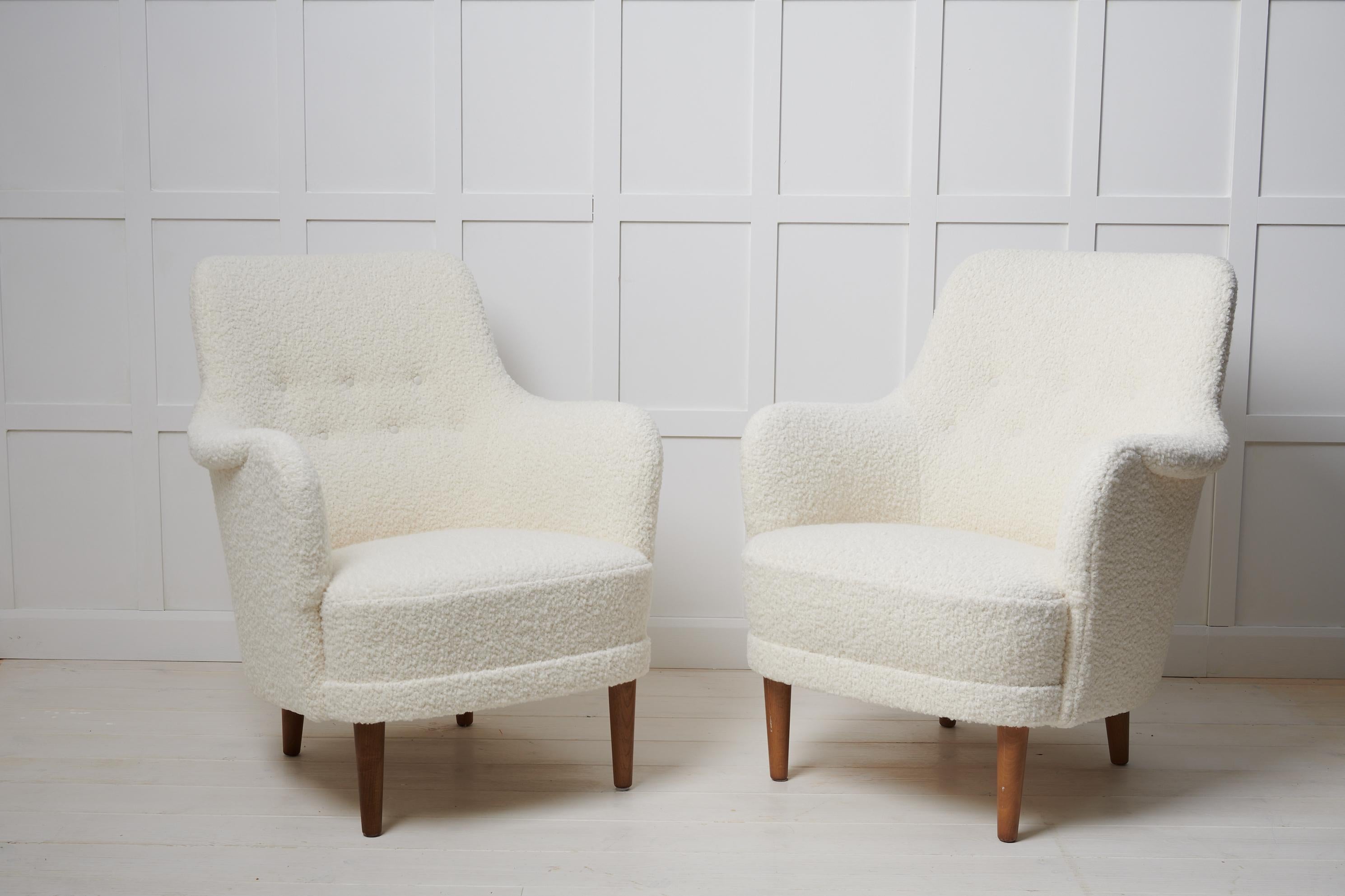 Carl Malmsten Samsas armchairs for O.H. Sjögren from the mid 20th century. The chairs are a Swedish modern classic and the Samsas series is today recognised as the most characteristic designs from Malmsten. The armchairs Samsas is a 1960s favourite