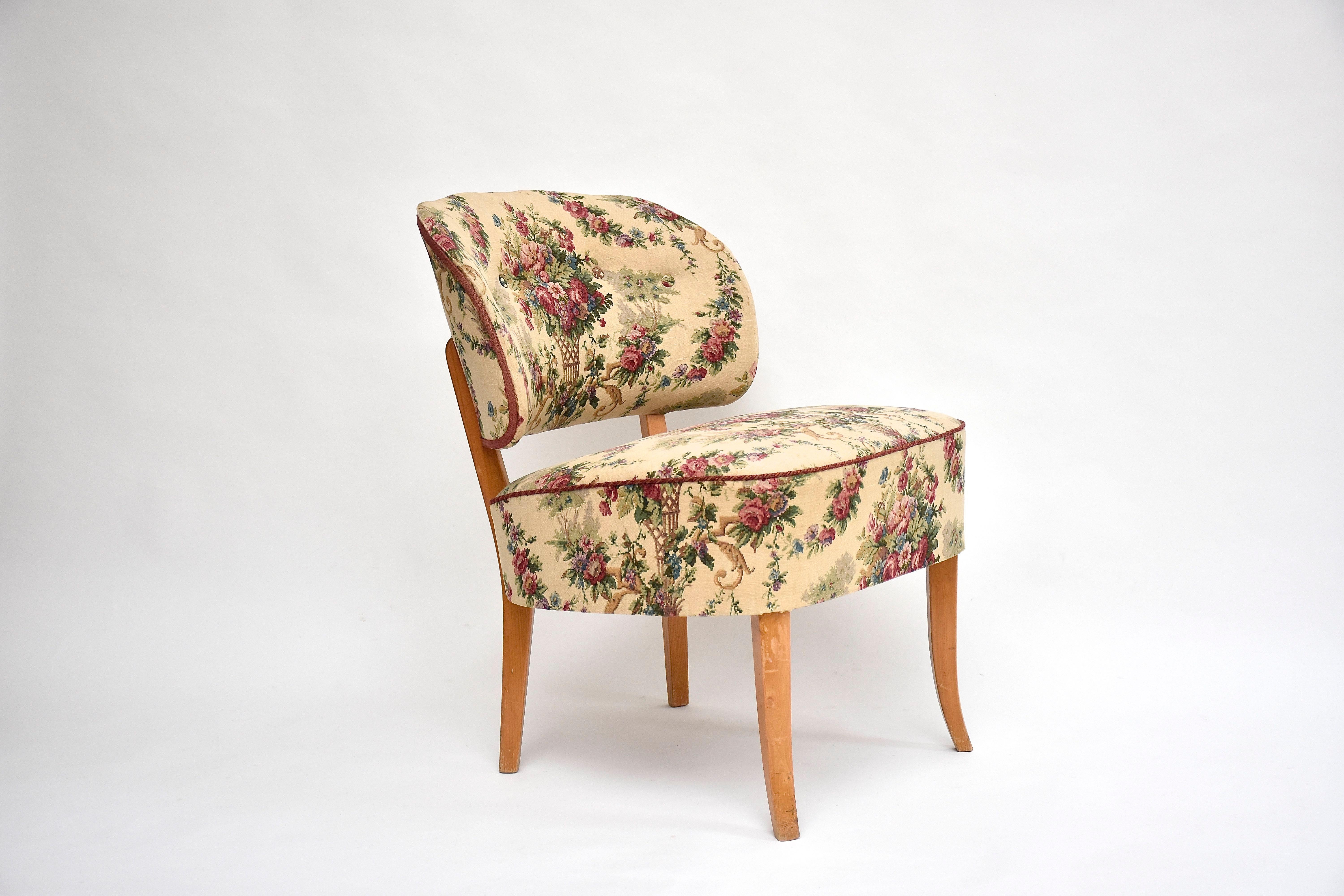Beautiful lounge or cocktail chair by the famous Swedish designer Carl Malmsten.
This elegant chair 'Old Berlin' has pretty rounded shape, padded back with tufted buttons.
 With light colour stylish wooden legs.
The chair is in its original