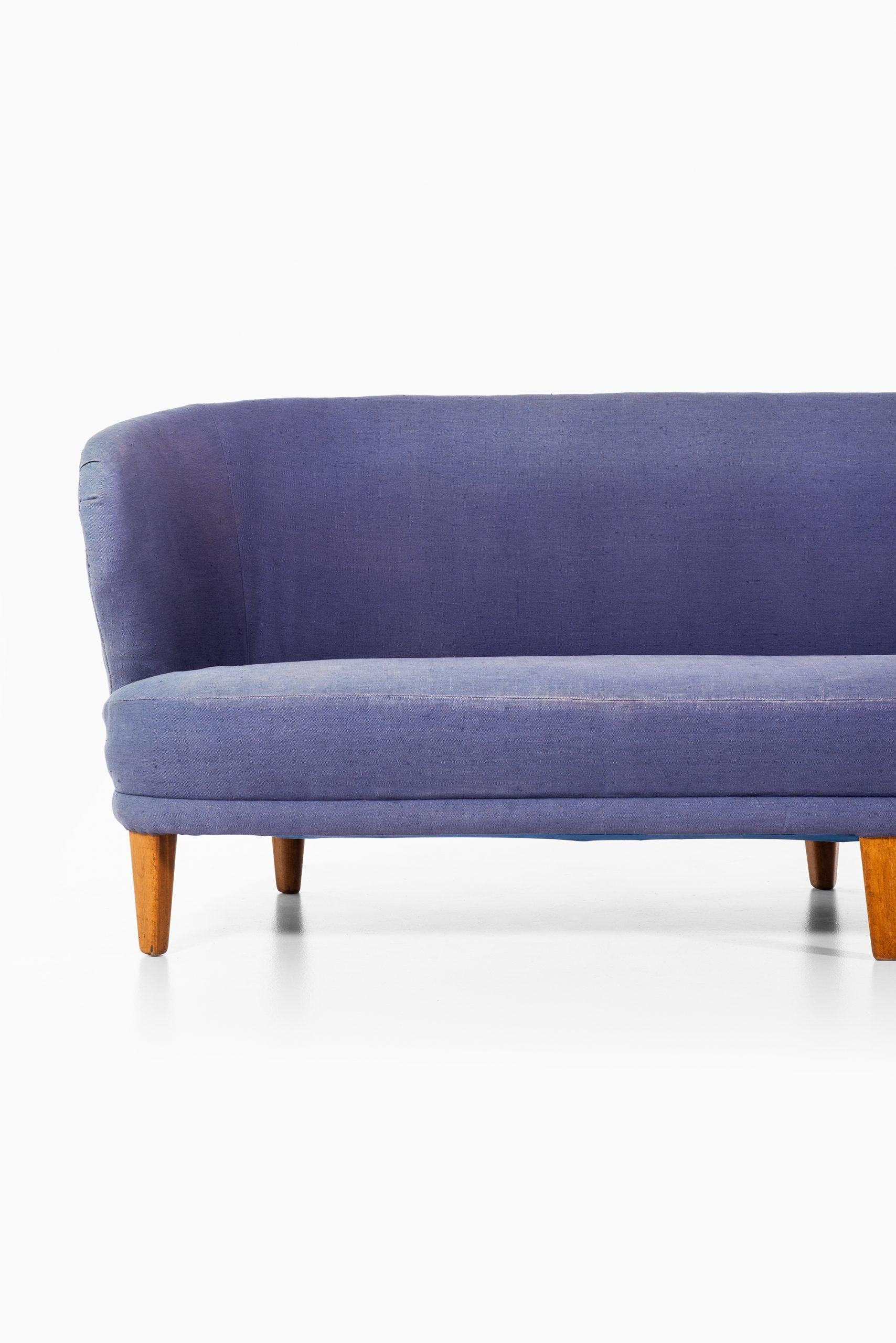 Rare and large version of the sofa model Berlin designed by Carl Malmsten. Produced by Carl Malmsten in Sweden.