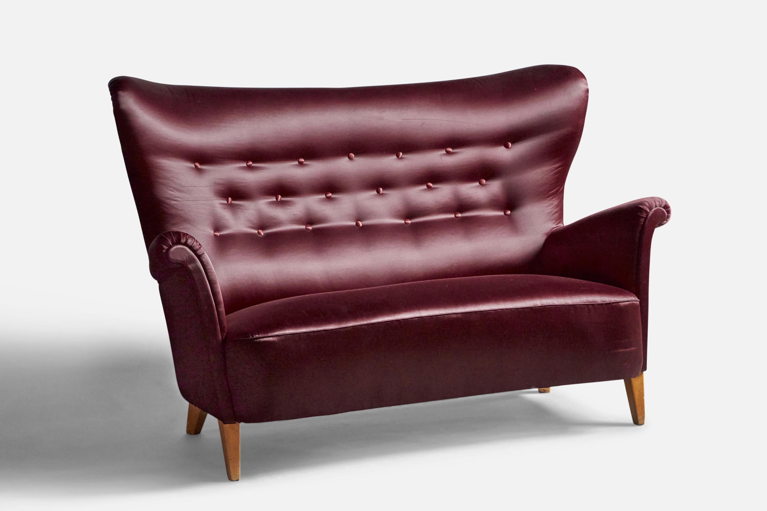 A purple velvet and birch sofa, designed and produced by Carl Malmsten, Sweden, c. 1940s.