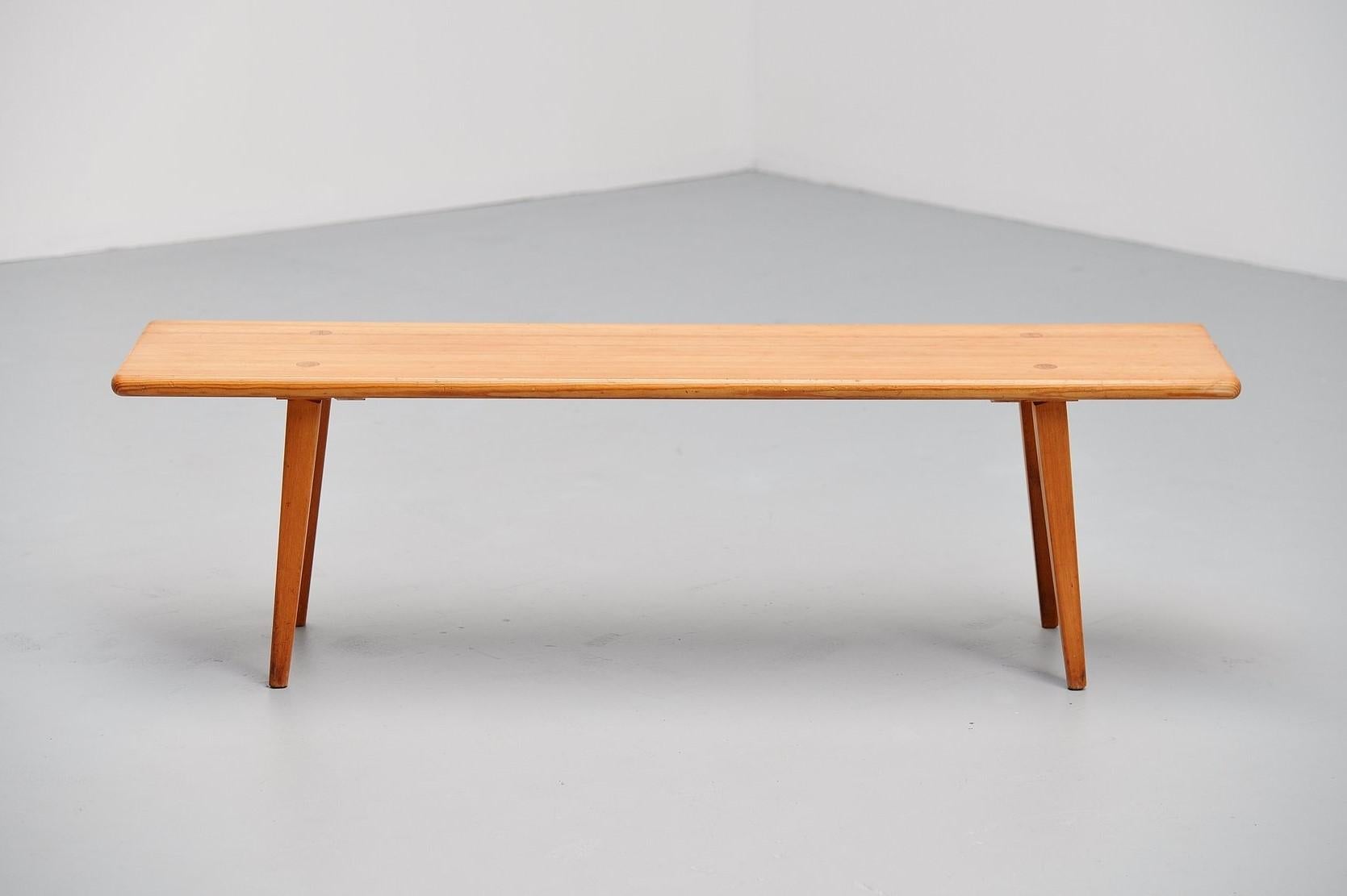 Nice and simple bench in solid pine wood designed by Carl Malmsten for Svensk Fur, Sweden, 1940. This early designed bench as made of fixed pine slats and have a look at the very nice detailed connection of the legs. Rare piece of Scandinavian