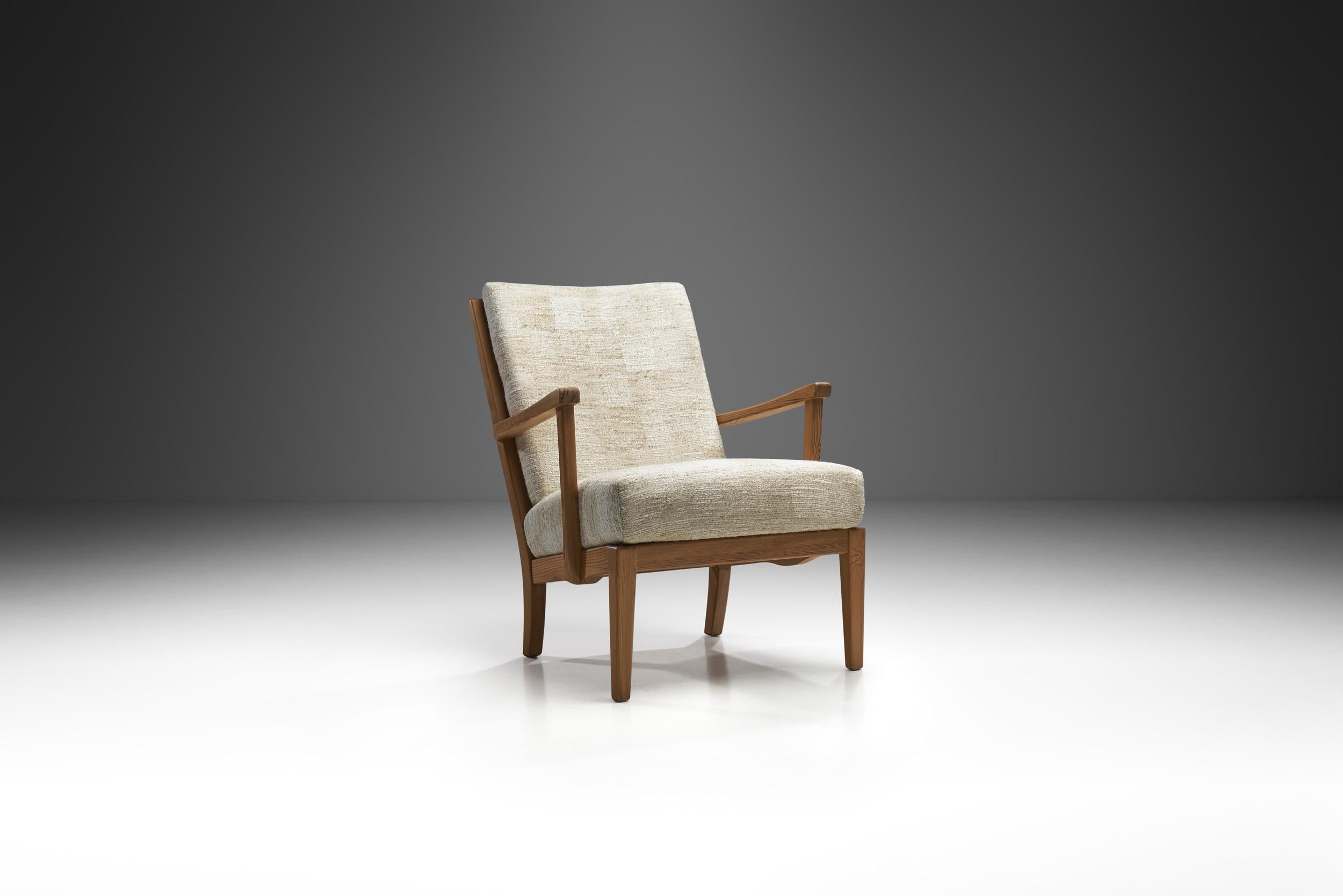 Carl Malmsten est l'un des plus célèbres designers de meubles suédois. Nombre de ses meubles sont considérés comme des classiques du design moderne. Le fauteuil Stugan (Cottage ou Cabin en suédois) a été conçu par Malmsten pour OH Sjögrens