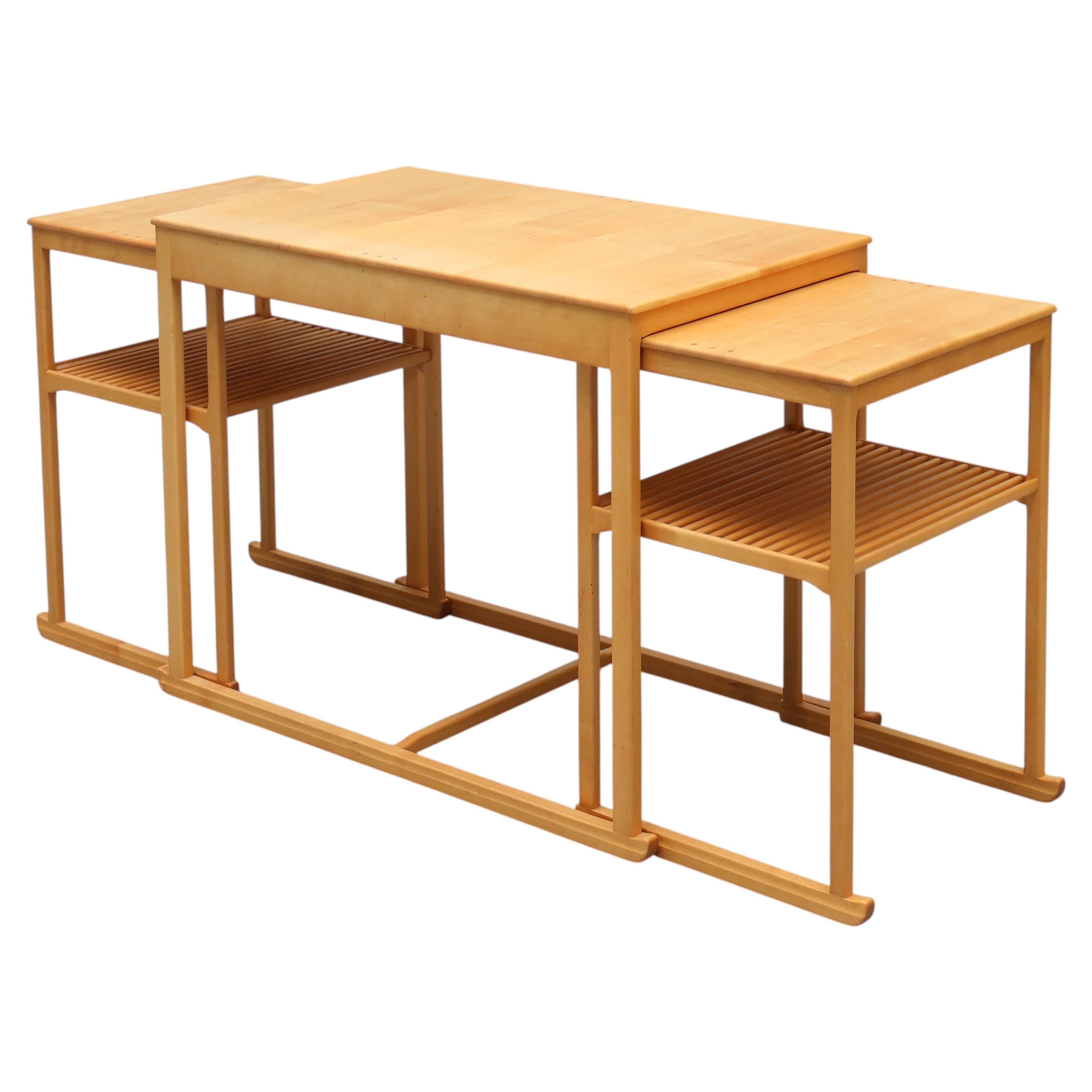 CARL MALMSTEN. “The Sled” Nesting Tables in birch, Sweden, 1950s For Sale