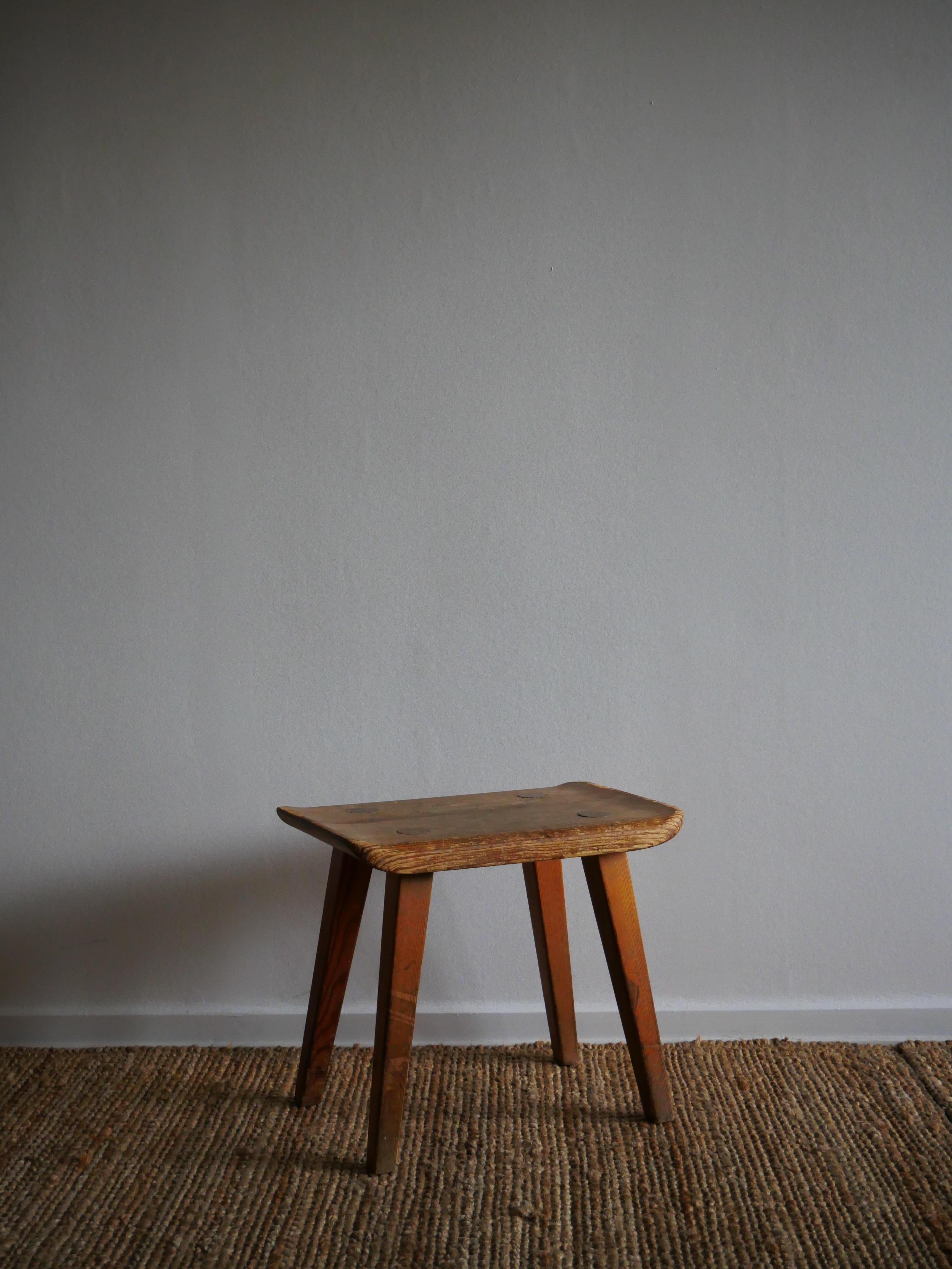 Carl Malmsten, Visingsö stool - Waggeryds Möbelfabriken, Sweden.
Simple but elegant handmade craftsmanship.
Has a thick patina and worned edges.

  