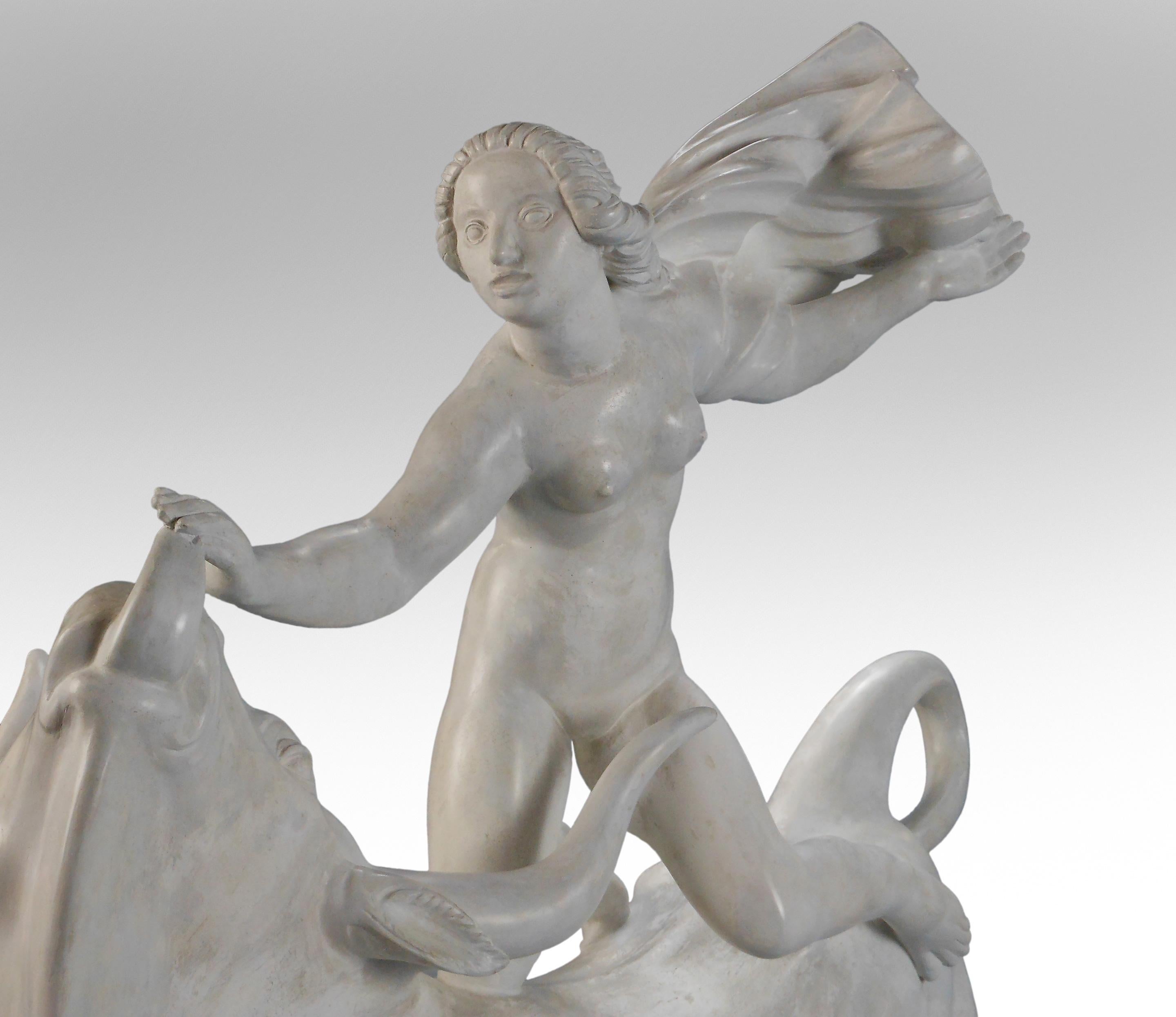 Carl Milles, Rare Plaster Sculpture of Europa and the Bull,
circa 1925
Kneeling astride the vigorous bull, Europa is poised in flight, her cloak blowing in the wind, raised on a rectangular contoured base with foliate frieze.
Europa and the Bull