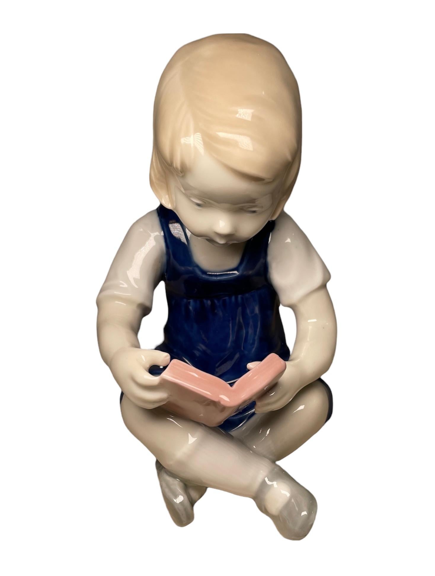 20th Century Carl Scheidig German Hand Painted Porcelain Figurine of a Girl Reading a Book