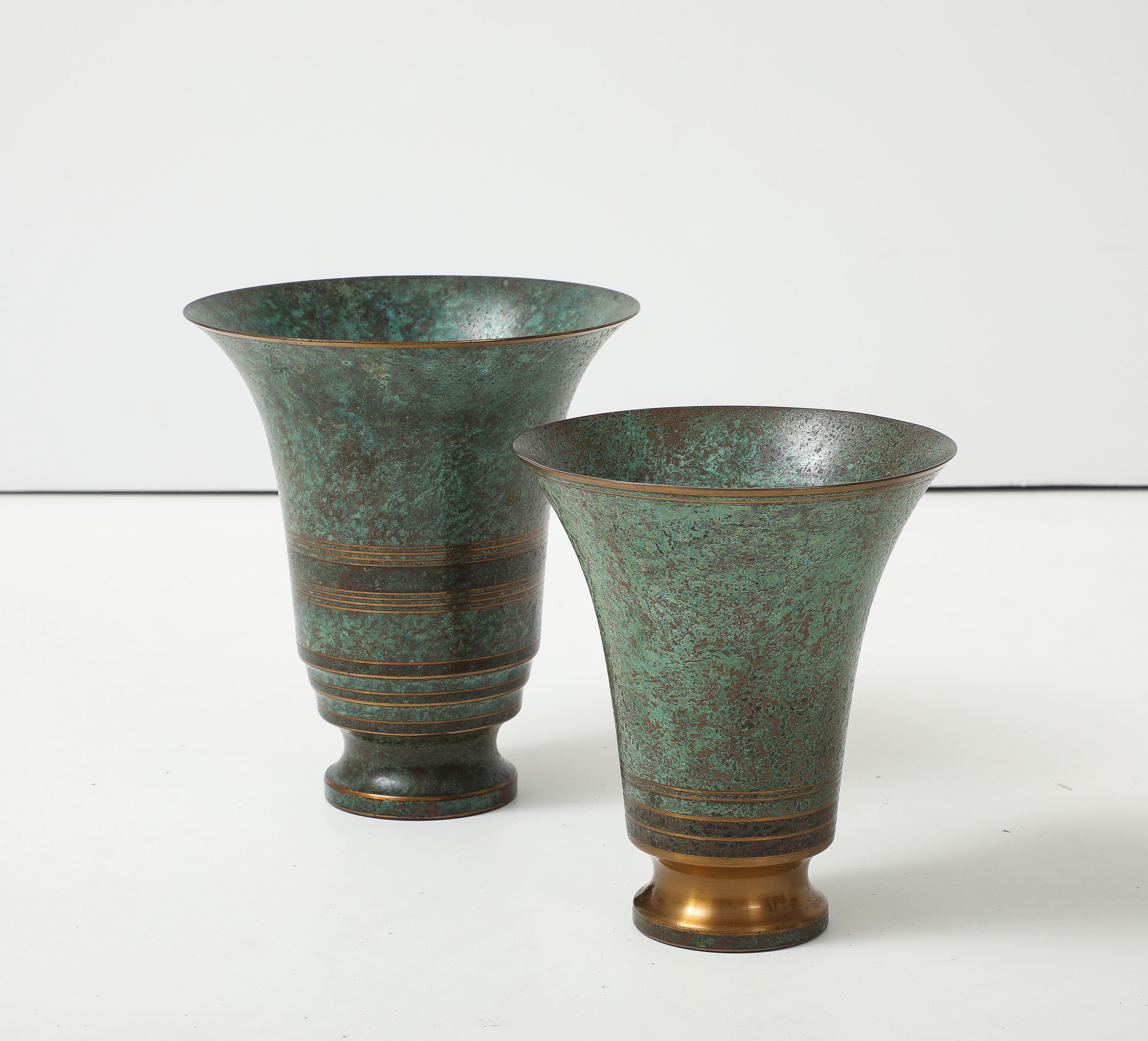 1940's Art-Deco bronze vases by Carl Sorensen, in vintage original condition with minor wear and patina due to age and use.

Smaller vase measurements: width 7'' height 6.25''
