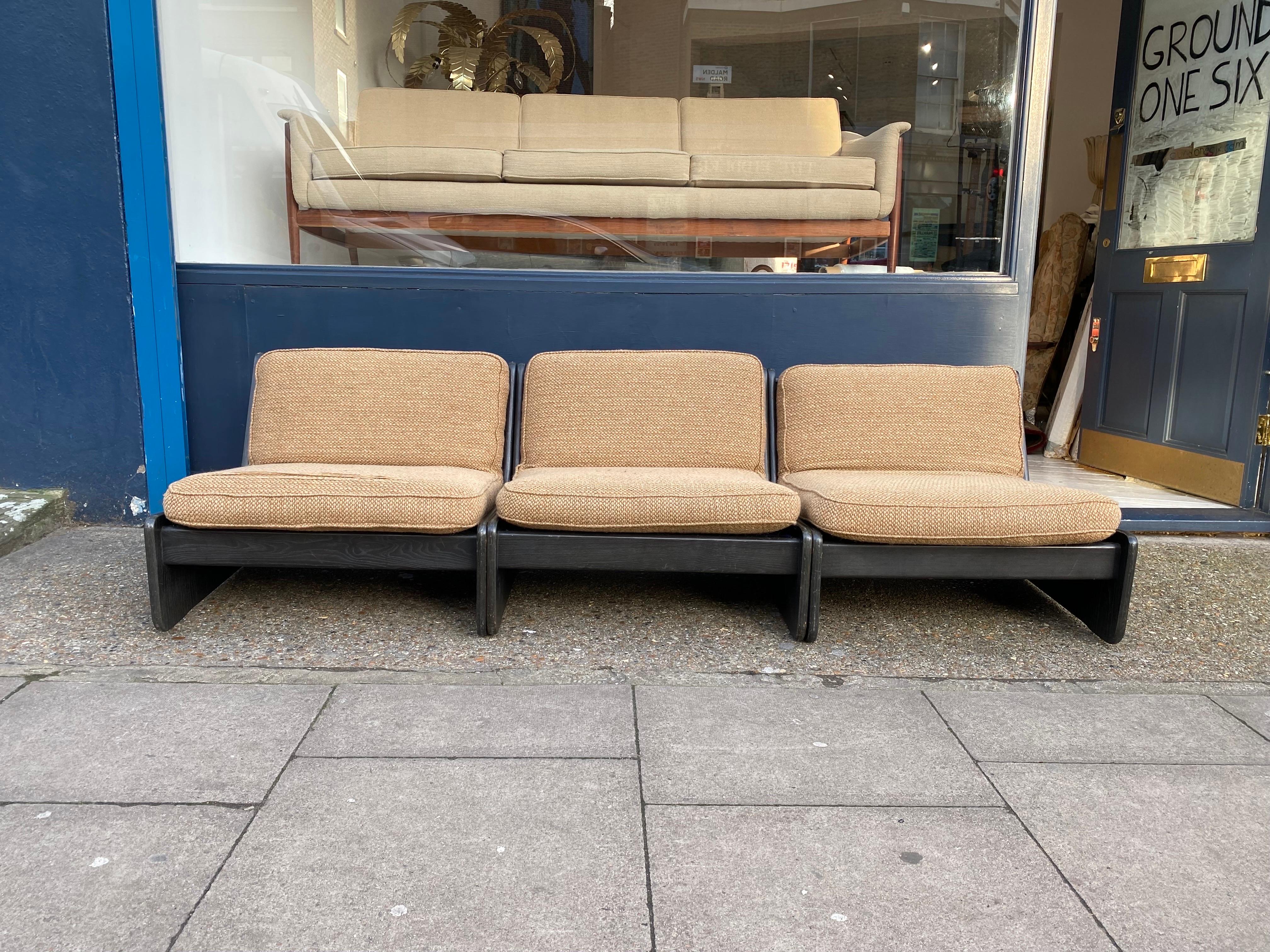Three piece modular lounge sofa in brown wood frame and beige wool upholstery by Carl Straub.
Supremely comfortable, and with a sleek low seat and back, this sofa would be ideal for any interior due to its versatility and combination possibilities.