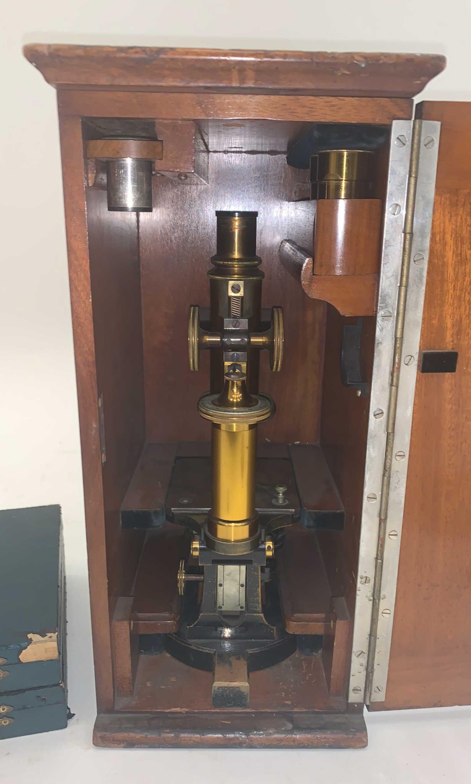 This incredible microscope dates from the late 19th century, during which Carl Zeiss and Edward Abbe were the foremost innovators of revolutionary microscope lens technology. It is a Stand IV continental-style microscope, featuring a polished brass