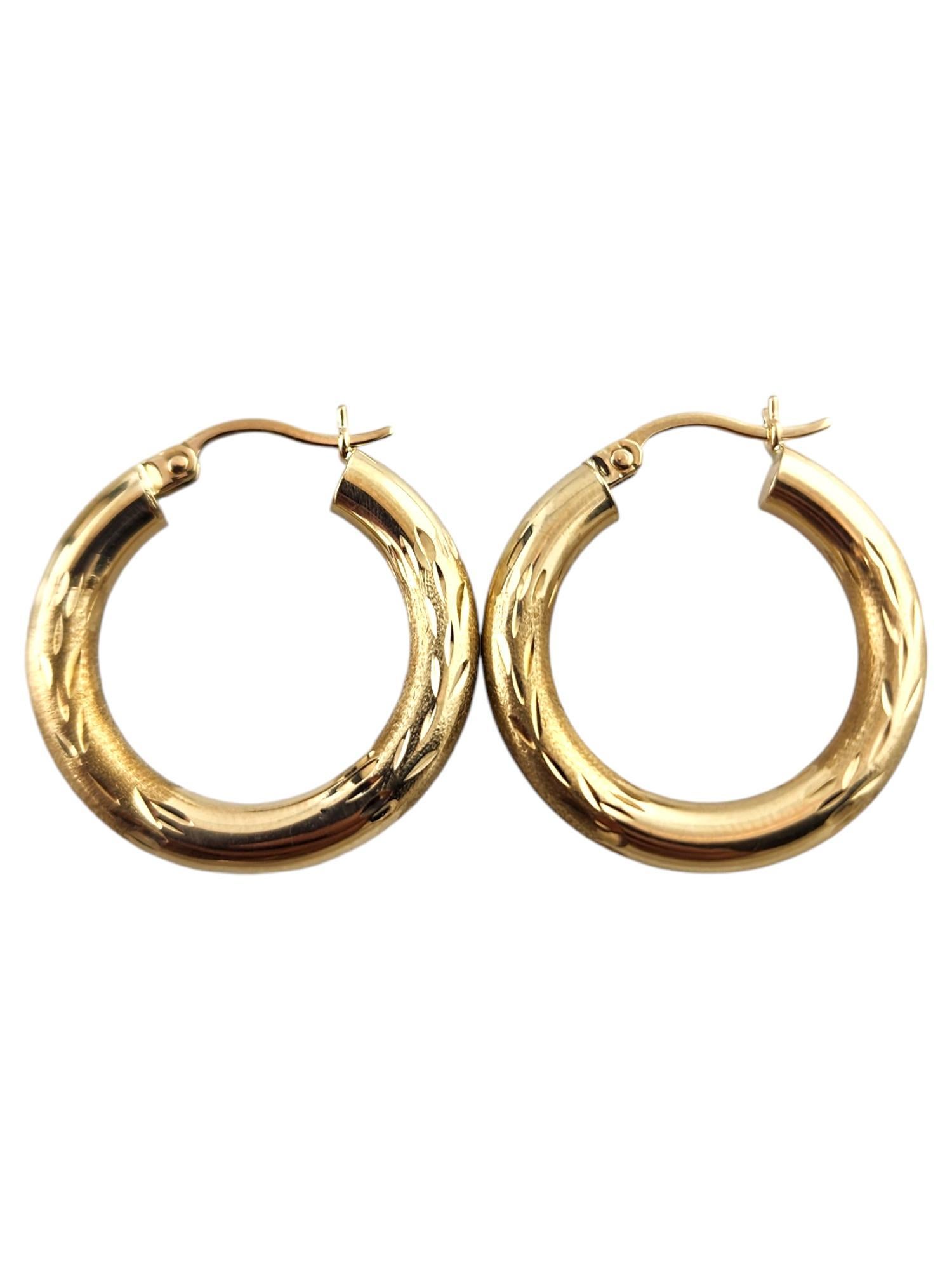 Women's Carla 14 Karat Yellow Gold Textured Hoop Earrings #18903 For Sale