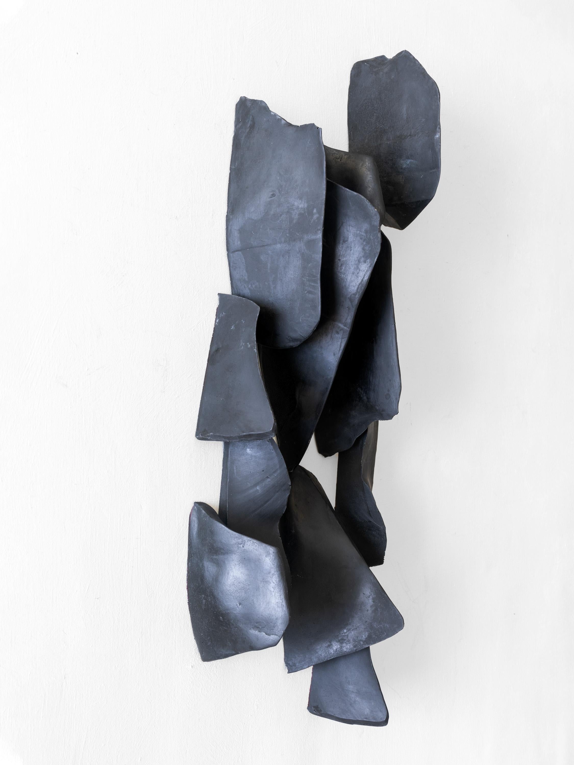 Cuerpos Magnéticos #3. Wall sculpture - Gray Still-Life Sculpture by Carla Gimbatti