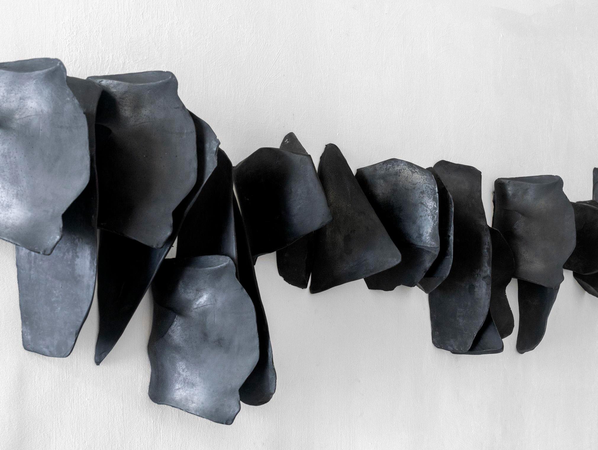 Cuerpos Magnéticos #7. Wall sculpture - Gray Still-Life Sculpture by Carla Gimbatti