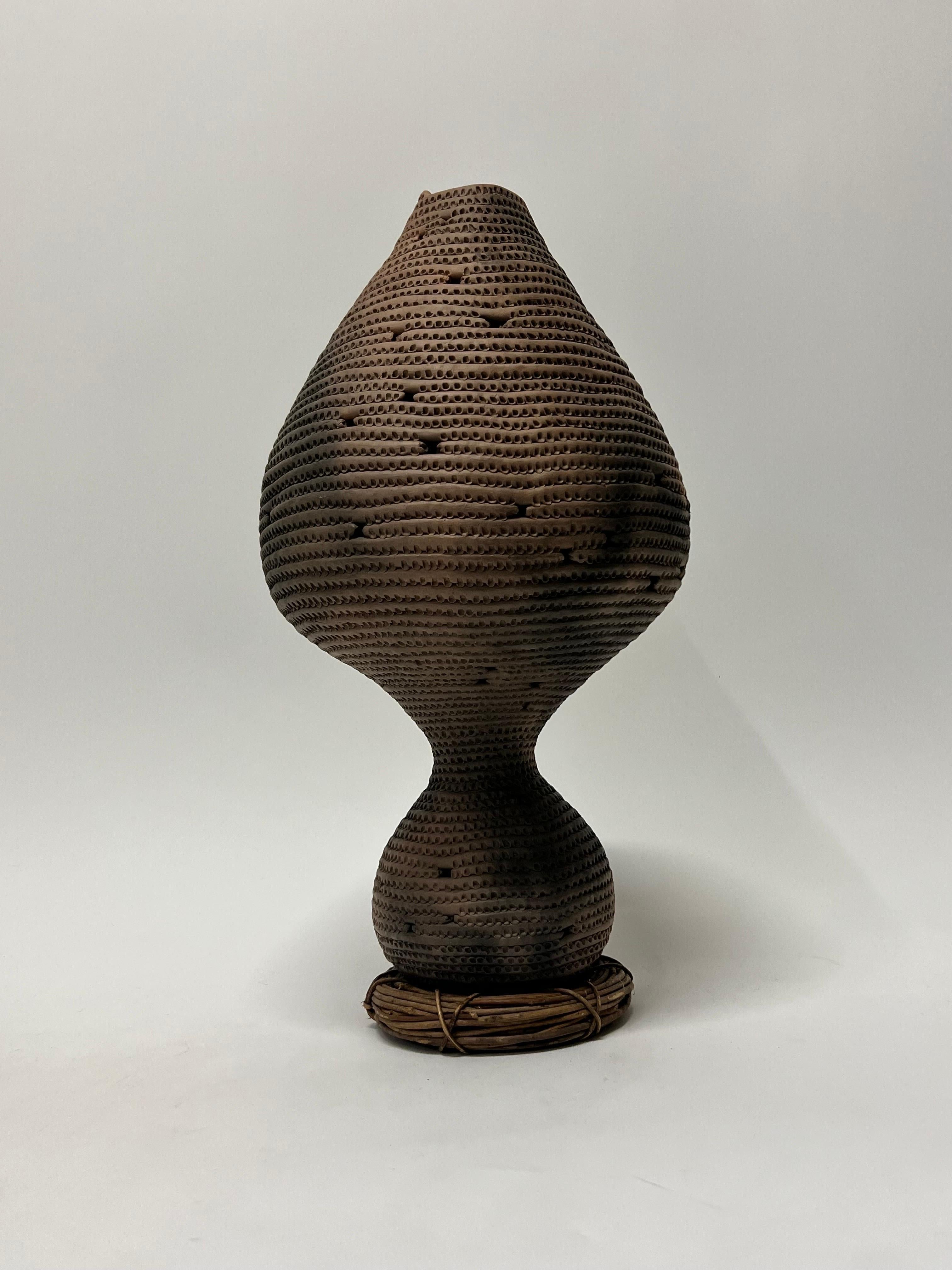 Carla Malone Ceramic Sculpture Vessel c1980s. Malone (1954-1996) lived most of her life in Stockton, California. Her vessels pay homage to those of ancient cultures. They are allegorical contemporary forms that attempt to recapture a human element