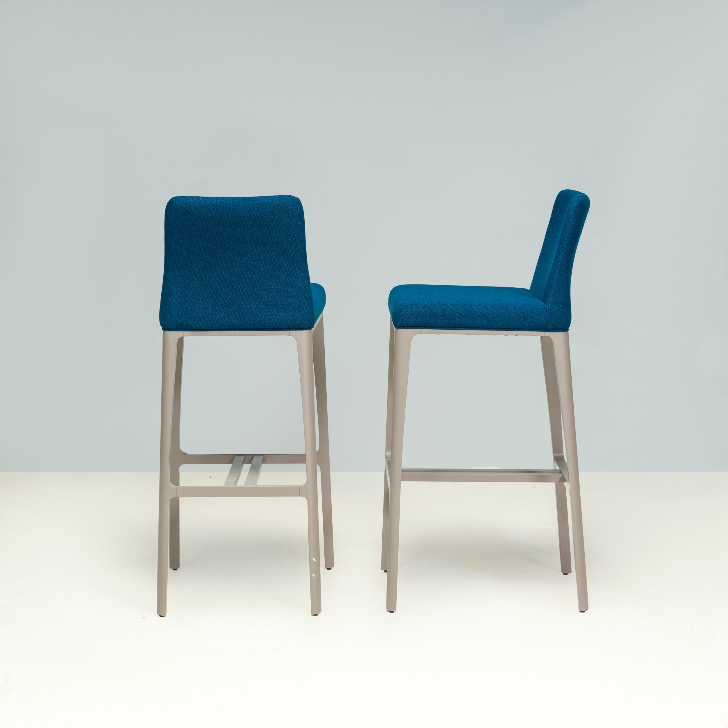 Designed by Carlesi Tonello Studio for Roche Bobois, the AIDA bar stool is a fantastic example of contemporary design,

Constructed from a beechwood frame, the stools have four elegant legs in a grey lacquered finish, with an aluminium footrest