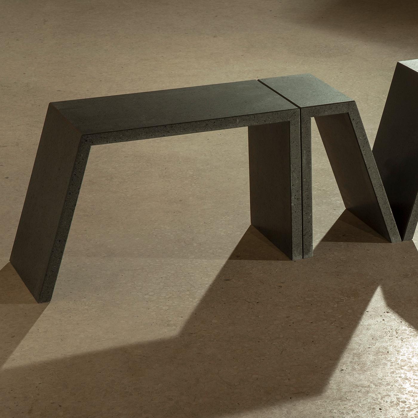 This refined contemporary coffee table fashioned of lava stone comprises modular elements that, together, create a geometric and elegant Silhouette. With an appearance that is at the same time light and playful, this piece is an easy addition to any