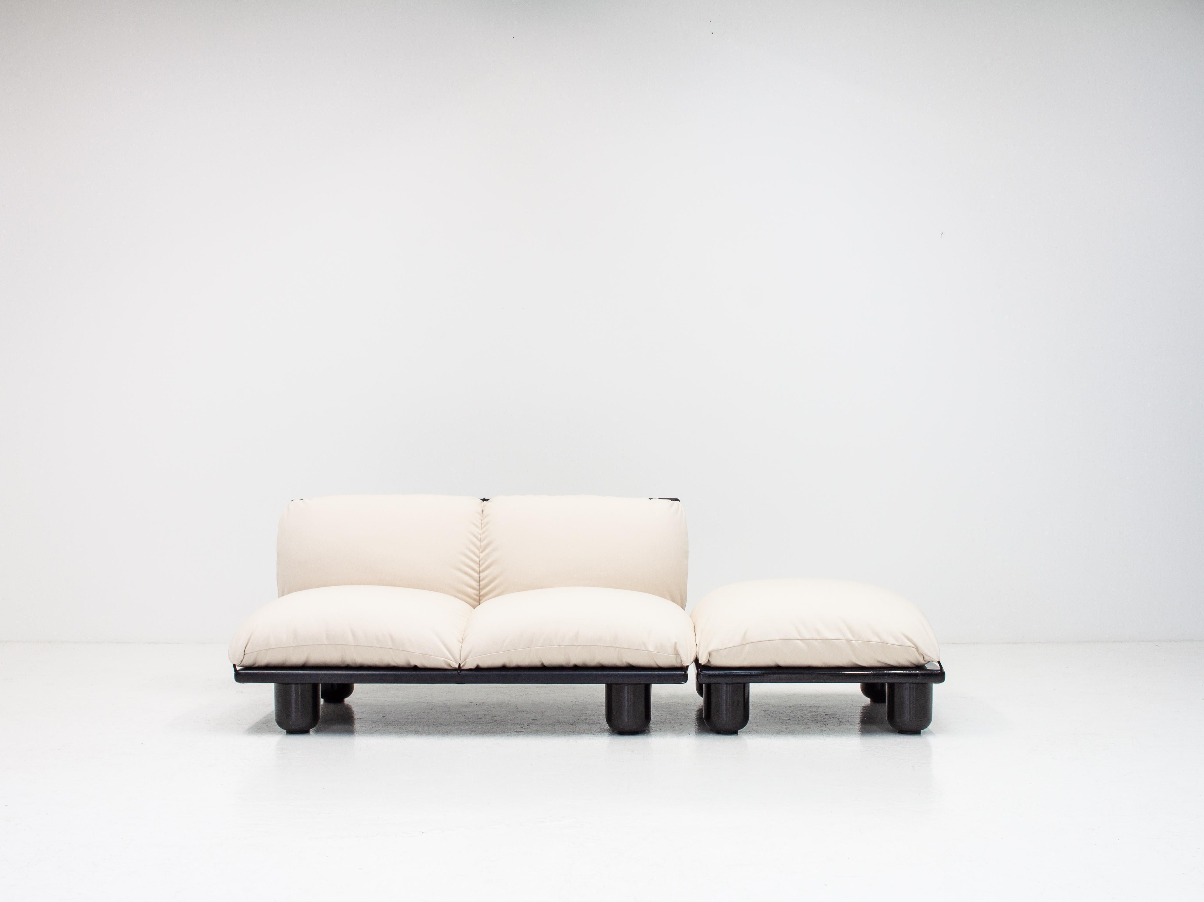 A Carlo Bartoli for Rossi Di Albizzate 'Blop' sofa and ottoman in an organic and recycled 100% cotton canvas from Pierre Frey.

The Blop modular system features oversized padded cushions with soft lines – the elements of the system consist of a