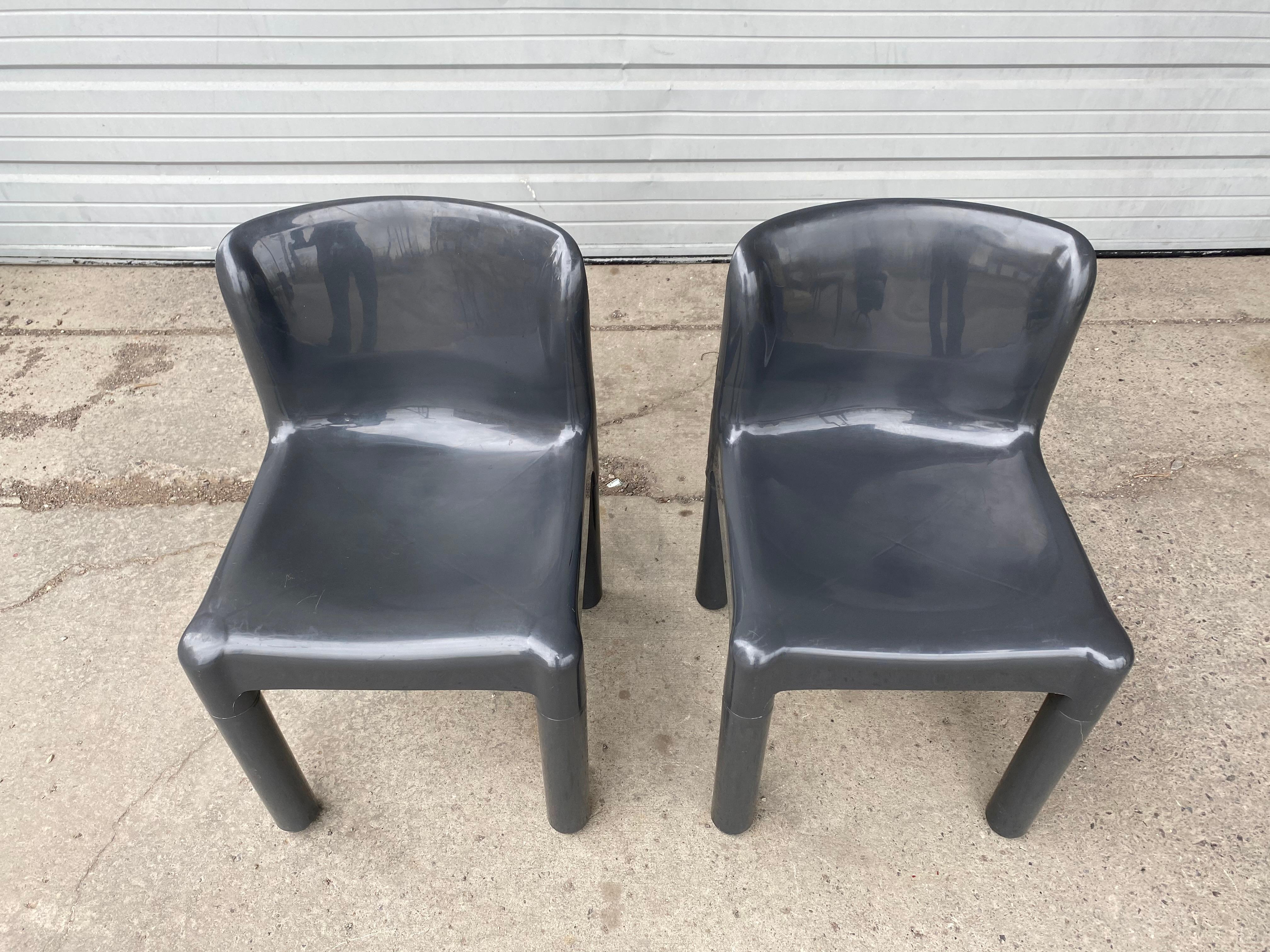 Early pair of Italian Modernist Polypropylene chairs designed by Carlo Bartoli for Kartell Italia in the 1970s model 4875, unusual color, art furniture, Nice original condition, minor scratches, scuffs, age appropriate wear.
