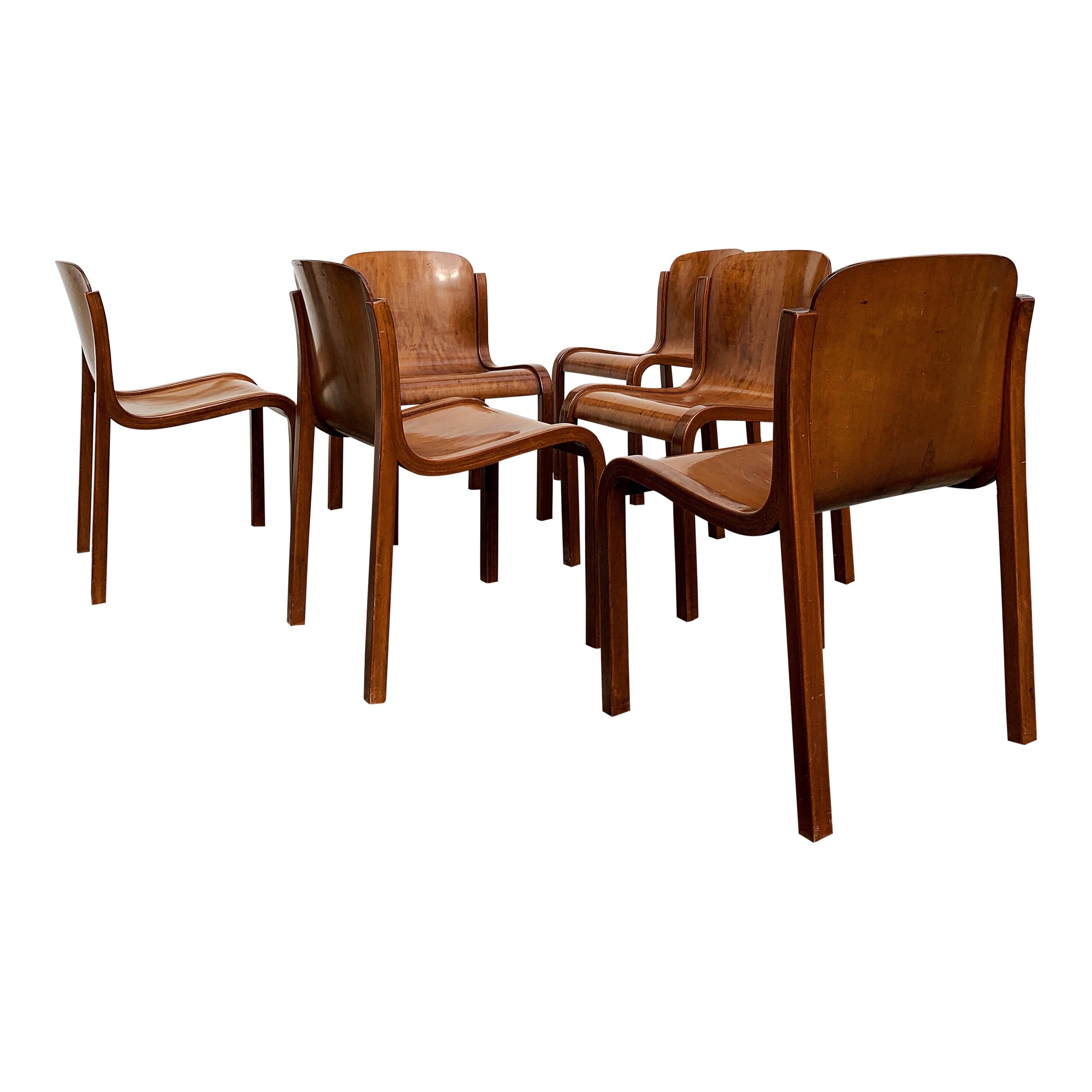 Set of six beautifully curved plywood dining chairs. 
Carlo Bartoli design for the Italian Manufacturer Tisettanta. Year of production 1969. Harmonic midcentury shapes perfect for the plywood lovers. 
Very lightweight but really solid beech wood
