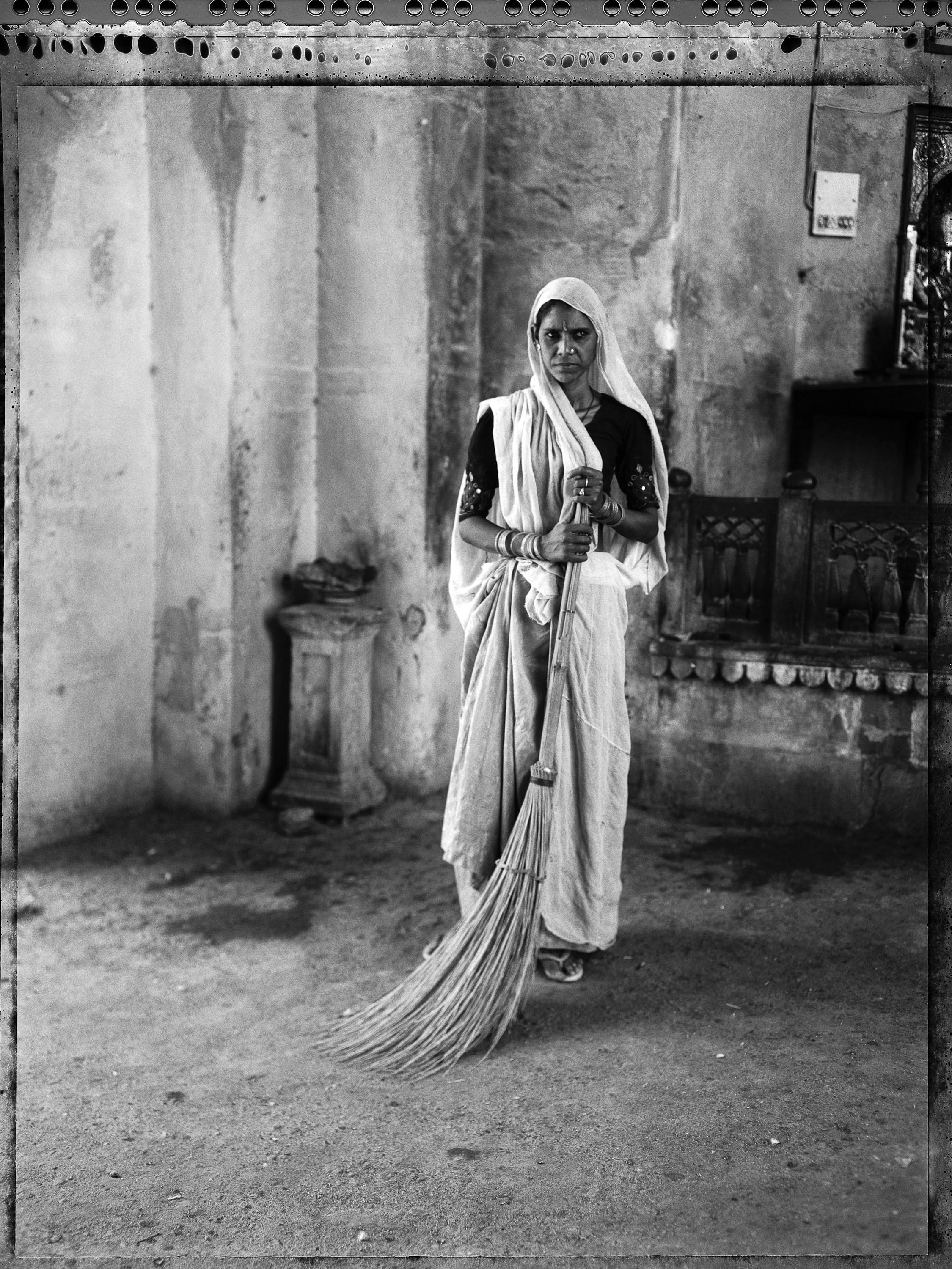 Carlo Bevilacqua Black and White Photograph - Dalit woman in a courtyard - Rajastan - India - ( from  Indian Stills series )