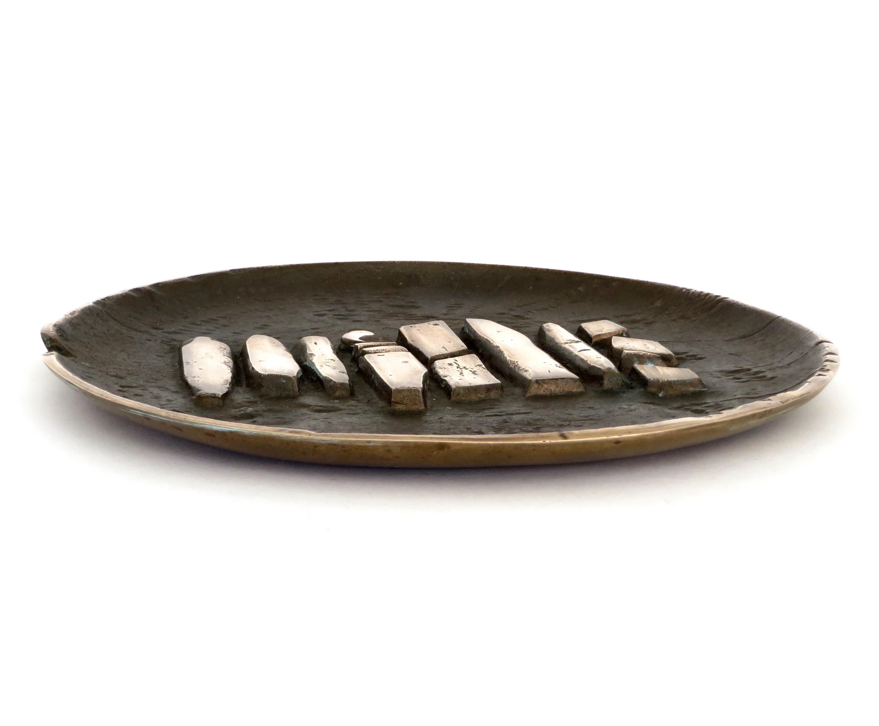 A bronze sculptural charger or large flat sculpture signed Carlo Brera 53 / 100 edition by ESART Italy. 
Abstract raised and polished forms reminiscent of Japanese or Chinese calligraphy or landscape elements. 
Polished highlights and patinated