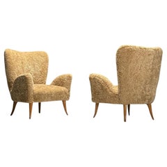 Carlo Broggi, Cantù, Italienische Loungesessel der Jahrhundertmitte, Shearling, 1950er Jahre