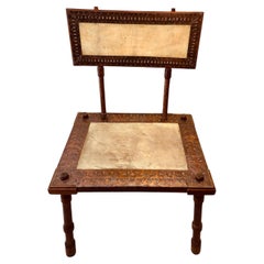 Carlo Bugatti (1856-1940), Chair, wood, parchment and copper, circa 1900.