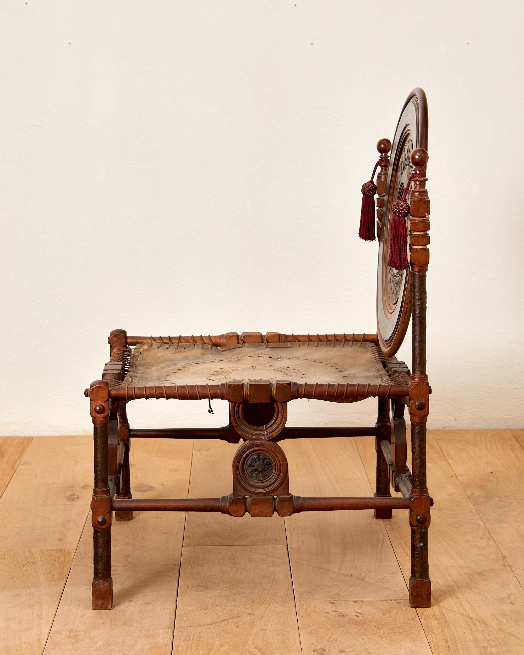 Modern Carlo Bugatti (1856-1940), chair, wood, parchment and copper, circa 1900, Italy.