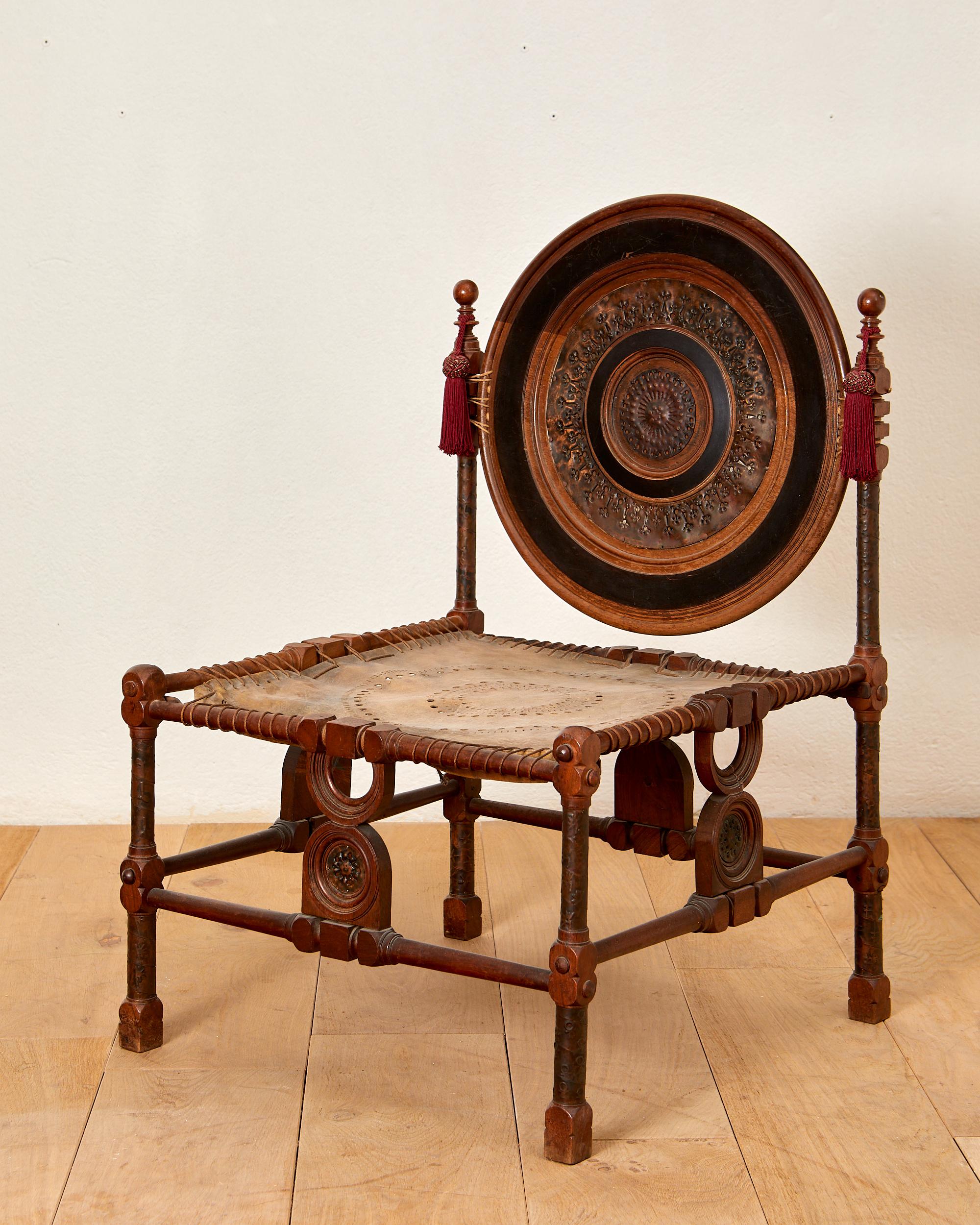 Early 20th Century Carlo Bugatti (1856-1940), chair, wood, parchment and copper, circa 1900, Italy.