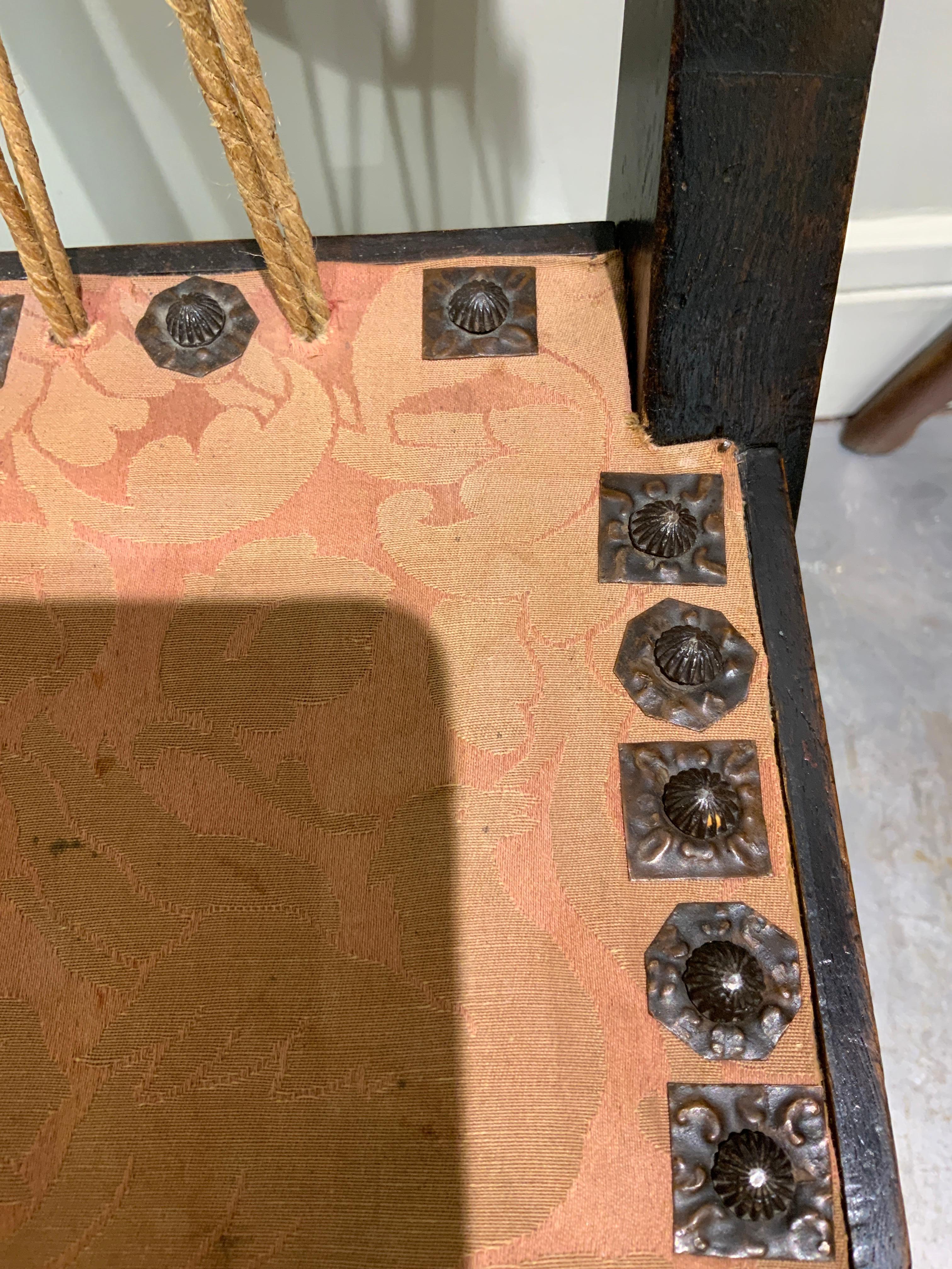 Fruitwood Carlo Bugatti “gong” side chair circa 1910
