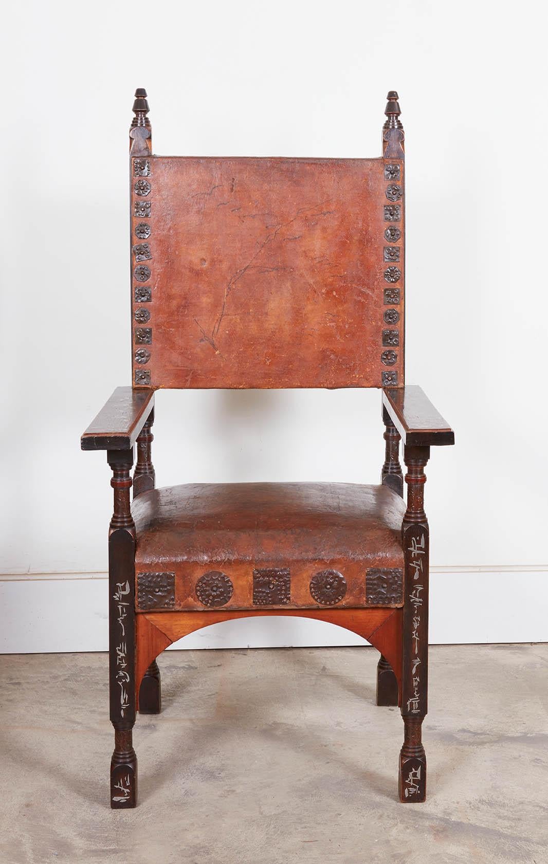 Walnut chair by Carlo Bugatti decorated with pewter and brass inlay and embossed copper, with period leather upholstery. Literature: Carlo-Rembrandt-Ettore-Jean Bugatti, Dejean, pg. 86 illustrates similar design. Italy: circa 1900 Provenance: