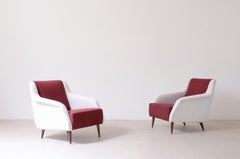 Carlo De Carli and Gio Ponti pair of Mod.802 armchairs covered in padded fabric