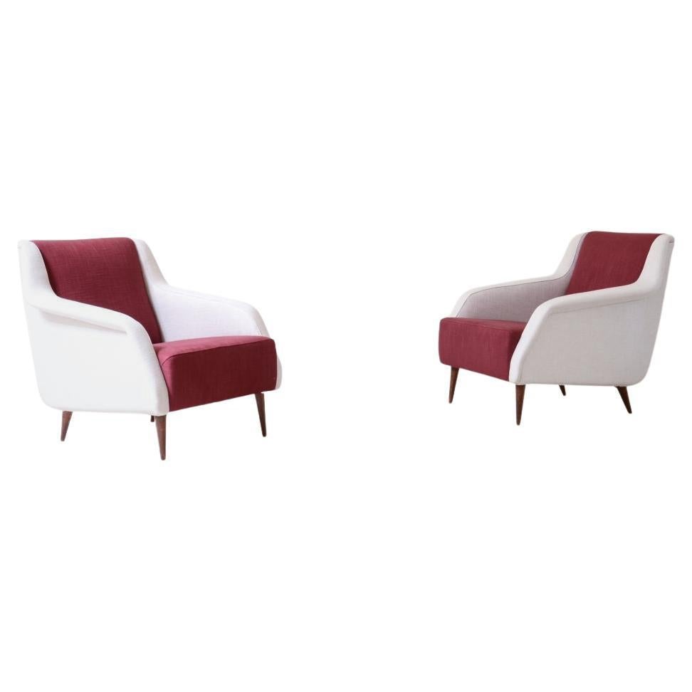 Carlo De Carli and Gio Ponti pair of Mod.802 armchairs covered in padded fabric
