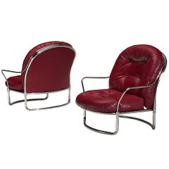Carlo De Carli per Cinova: coppia di poltrone “915” in pelle rosso bordeaux