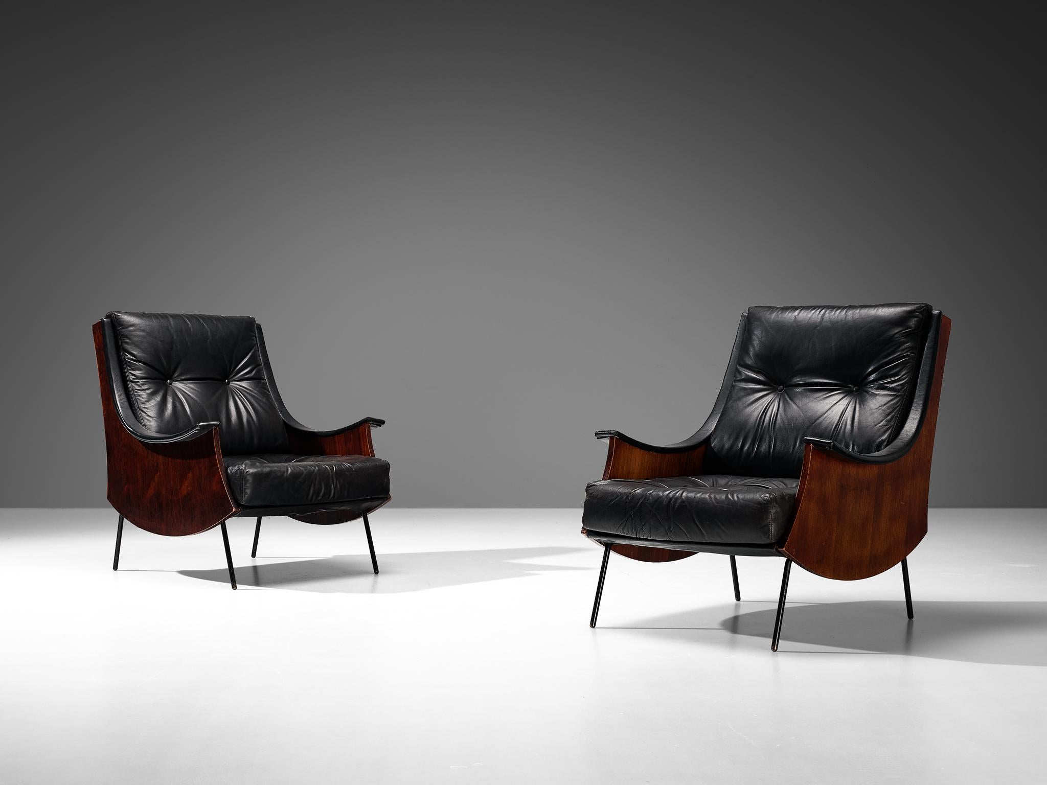 Carlo de Carli for Sormani, pair of 'PIPA' lounge chairs, wood, metal and leather, Italy, circa 1963.

A pair of 'PIPA' lounge chairs, designed by the Italian Carlo de Carli in circa 1963. He designed this model as a homage to his Professor Gio