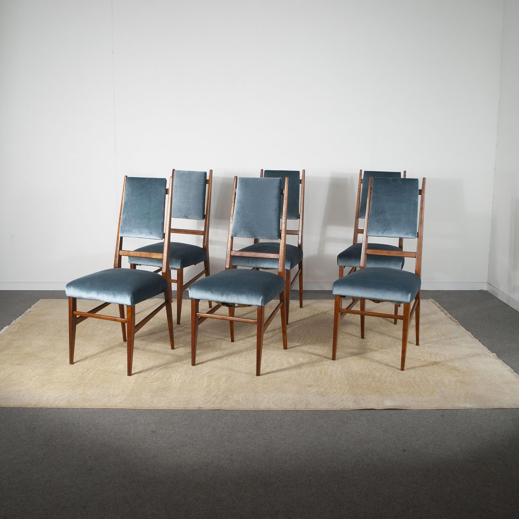 Elegant set consisting of six chairs with velvet seat and wooden frame with slender back, attributable to Carlo De Carli Italian production late 1950s. The unique design of this model makes the chair an object for true connoisseurs of iconic