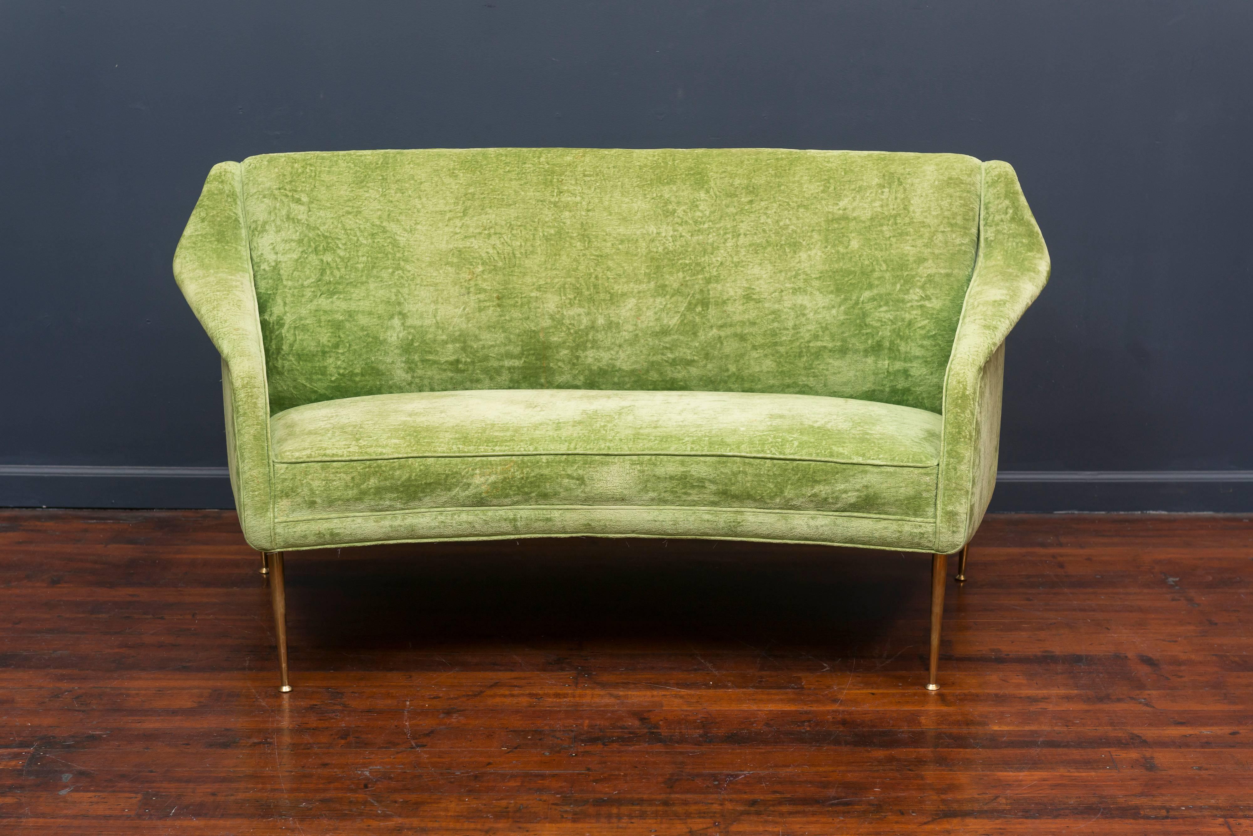 Rare settee model #159 designed settee by Carlo de Carli for Singer & Son's, Italy. Classic Italian midcentury design that is comfortable and sophisticated. Original velvet upholstery on polished brass legs.