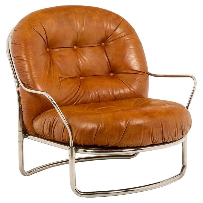Carlo Di Carli. Poltrona in pelle e metallo. 1970s. in vendita
