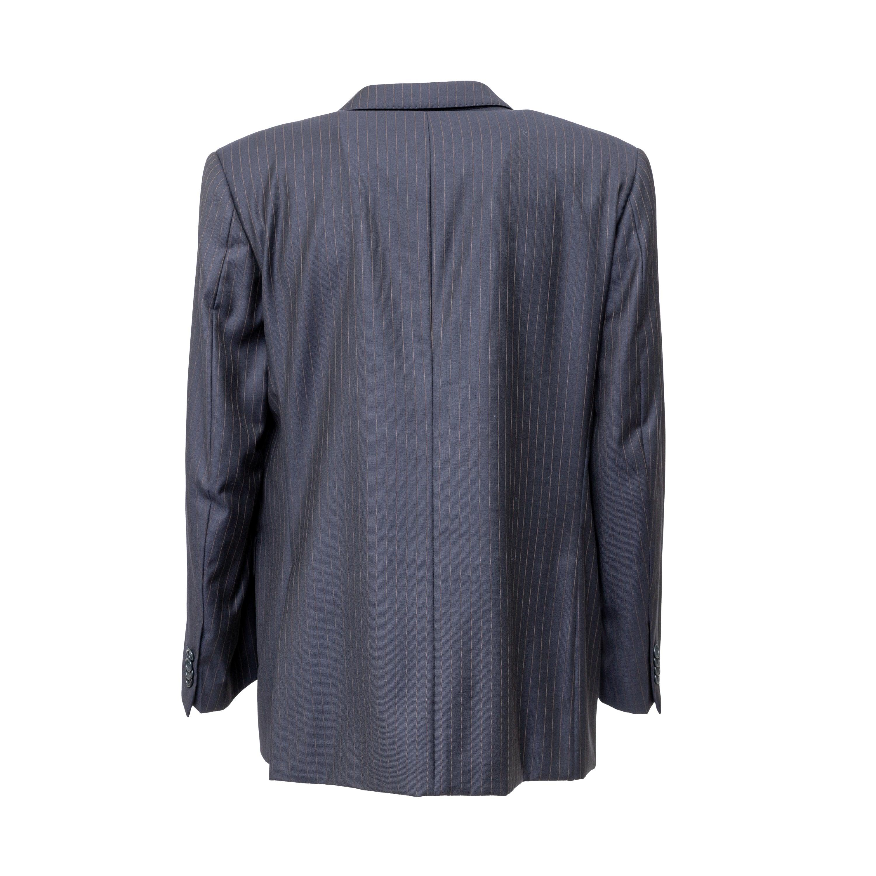Experience luxury and style with this Classic Pinstripe Suit from Carlo Dulbecco. Made with super 120's virgin wool for a soft and comfortable fit, this navy blue suit features a sleek pinstripe design, notched lapel collar, three front buttons, and