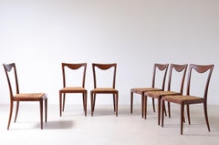 Carlo Enrico Rava, group of six elegant chairs in shaped wood