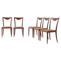 Carlo Enrico Rava, group of six elegant chairs in shaped wood