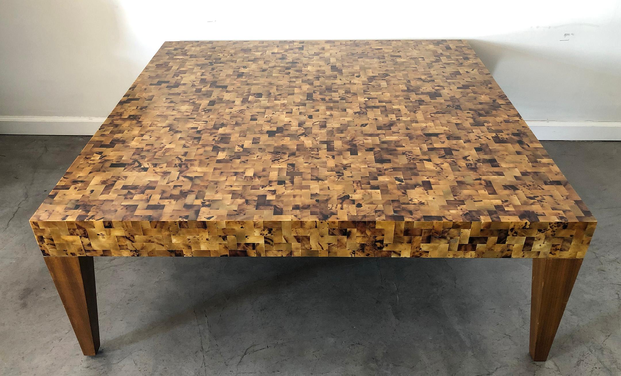 An absolutely stunning pen shell coffee table by Carlo Furniture. This square coffee table is composed of lacquered Yellow Sea Penshell and brings a modern warmth to any home or environment.

Carlo furniture is a luxury furniture line that