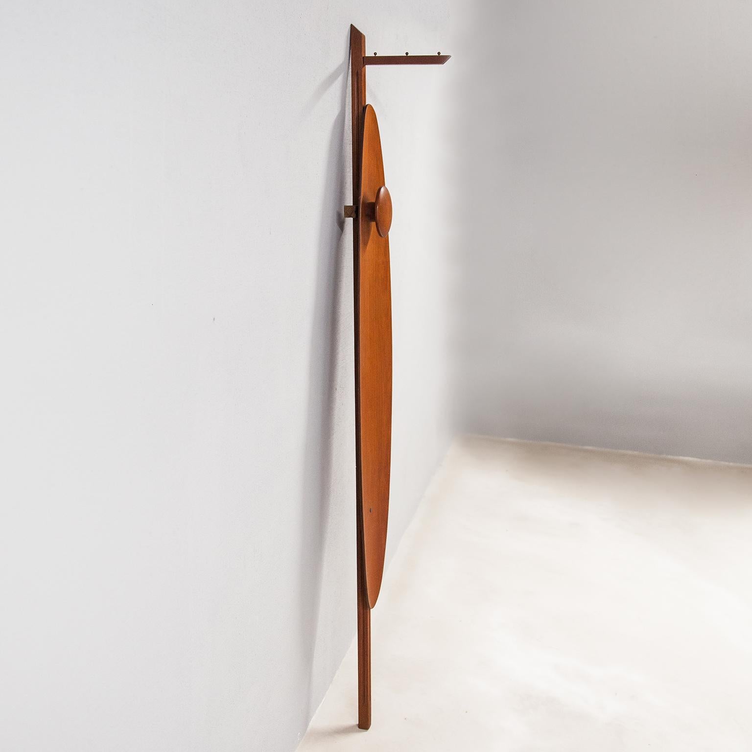 Elegant sculpture of a single coat stand hanger in teak attributed to Carlo Graffi Italy 1950s and in excellent vintage condition.